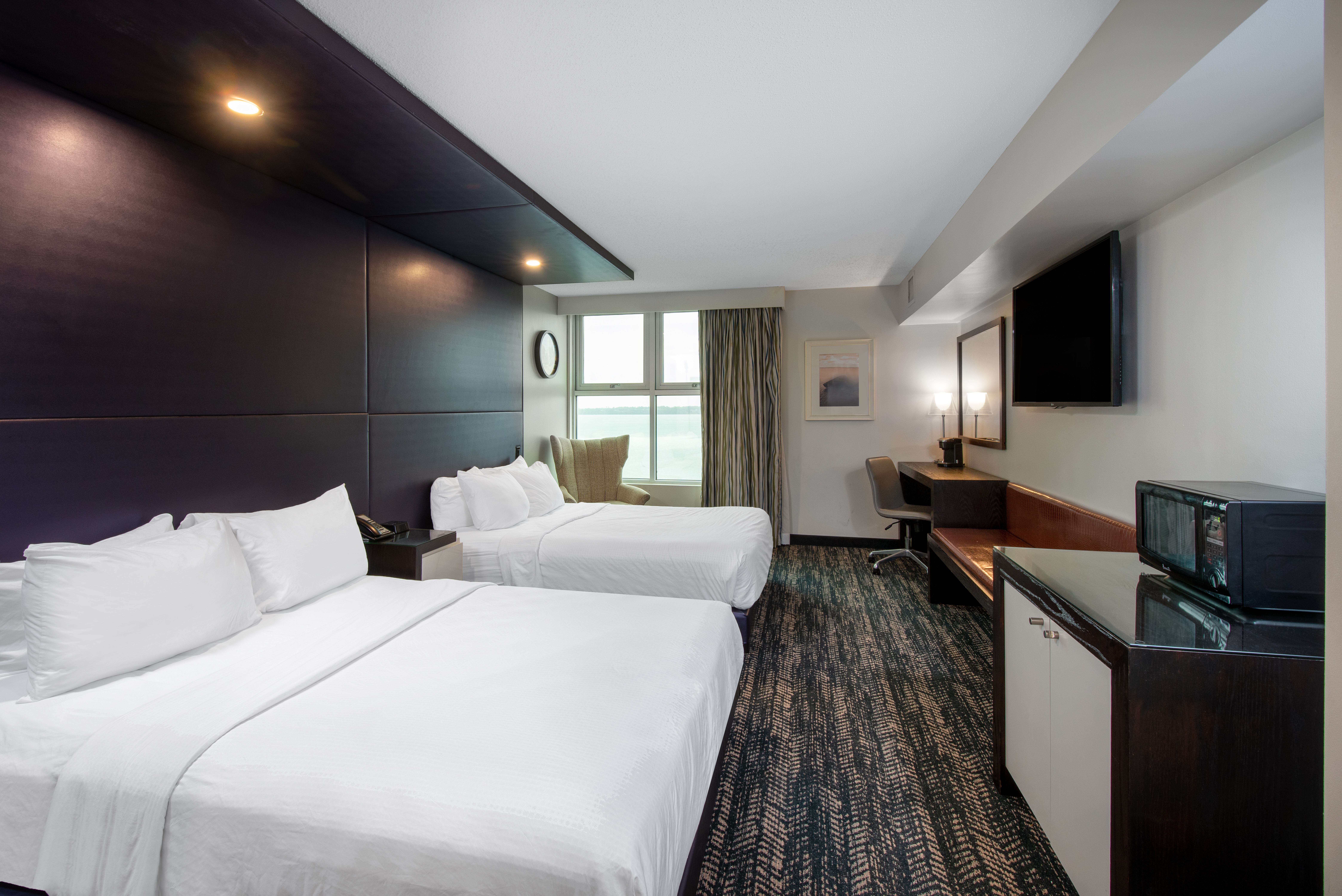 Guest room at the 41 Lakefront Hotel, Trademark Collection By Wyndham in Geneva, New York