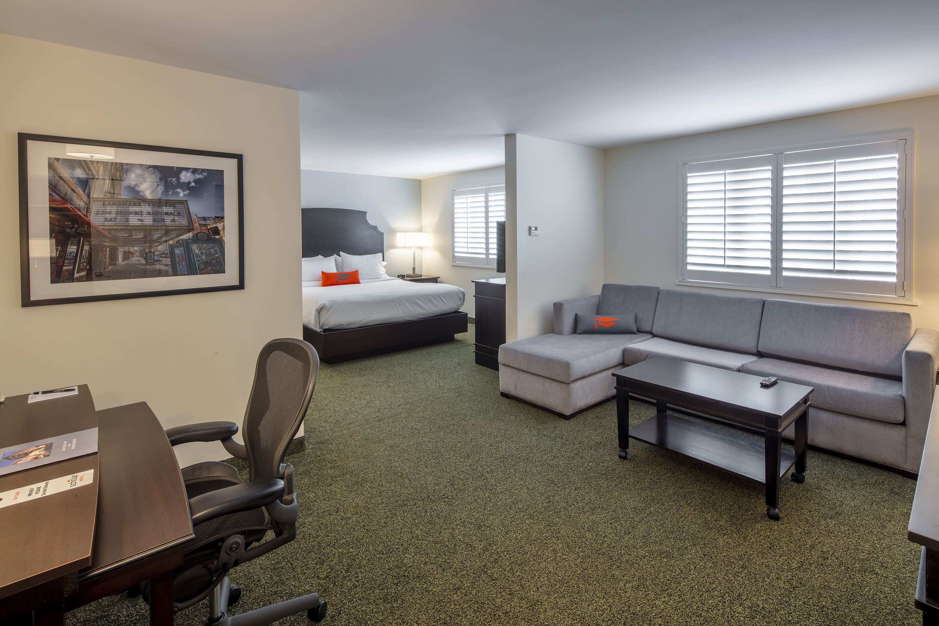 Guest room at the Collegian Hotel & Suites, Trademark Collection by Wyndham in Syracuse, New York