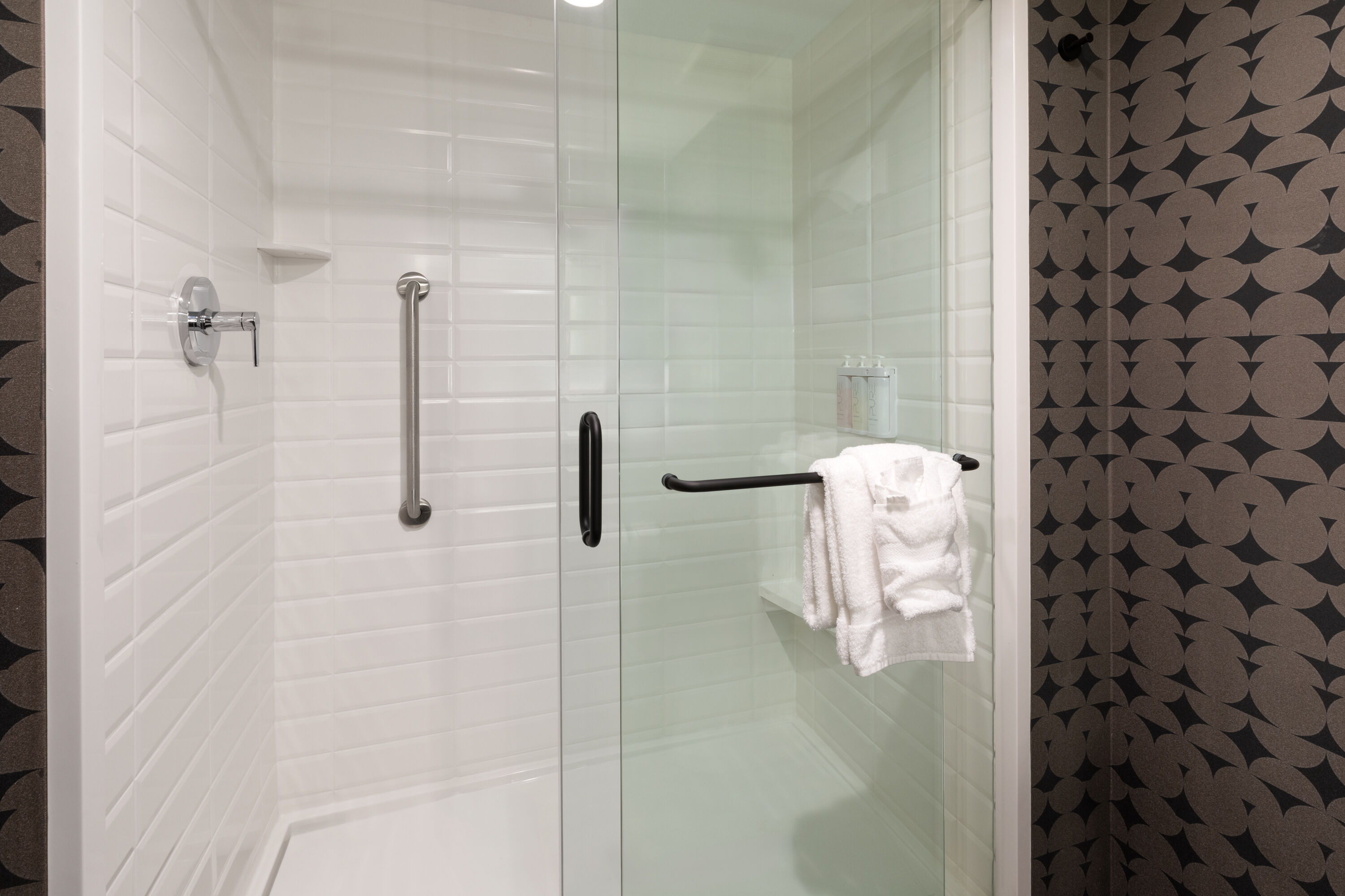 Guest room bath at the Riverbend Hotel and Suites, Trademark Collection by Wyndham in Ashtabula, Ohio