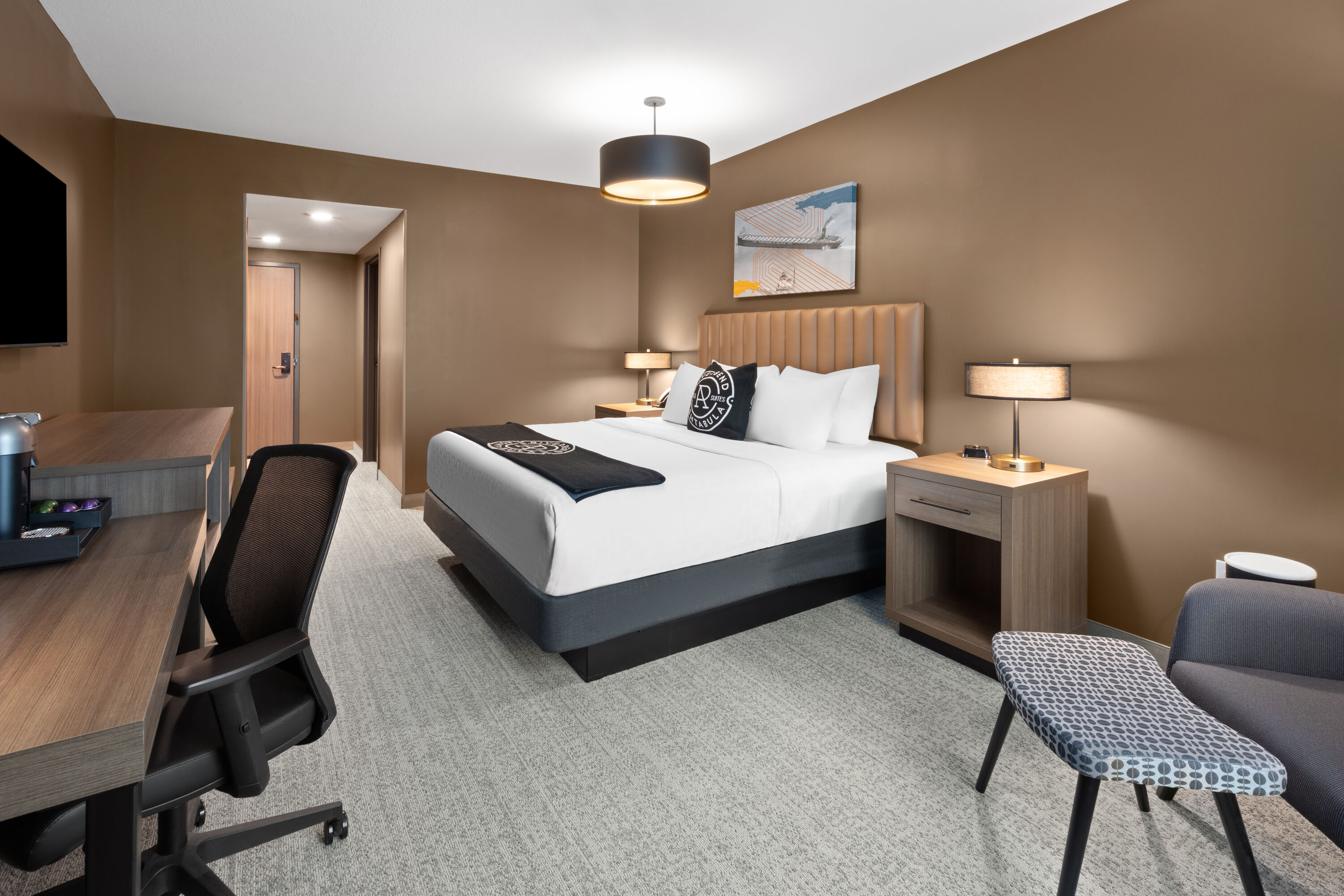Guest room at the Riverbend Hotel and Suites, Trademark Collection by Wyndham in Ashtabula, Ohio