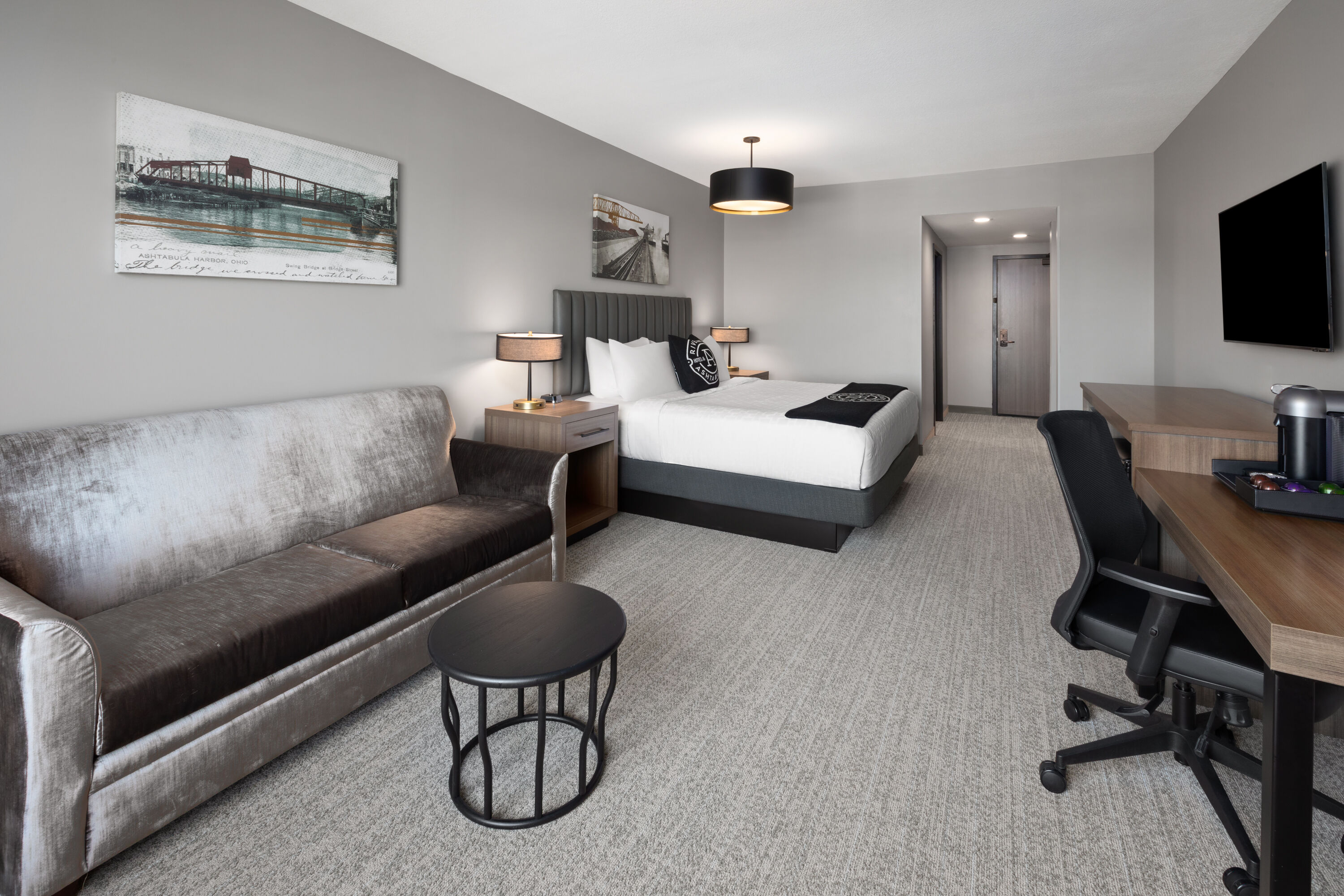 Guest room at the Riverbend Hotel and Suites, Trademark Collection by Wyndham in Ashtabula, Ohio