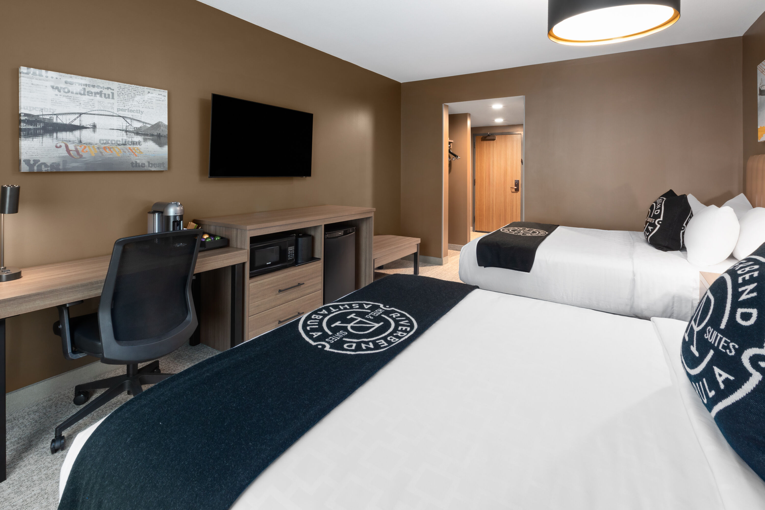 Guest room at the Riverbend Hotel and Suites, Trademark Collection by Wyndham in Ashtabula, Ohio