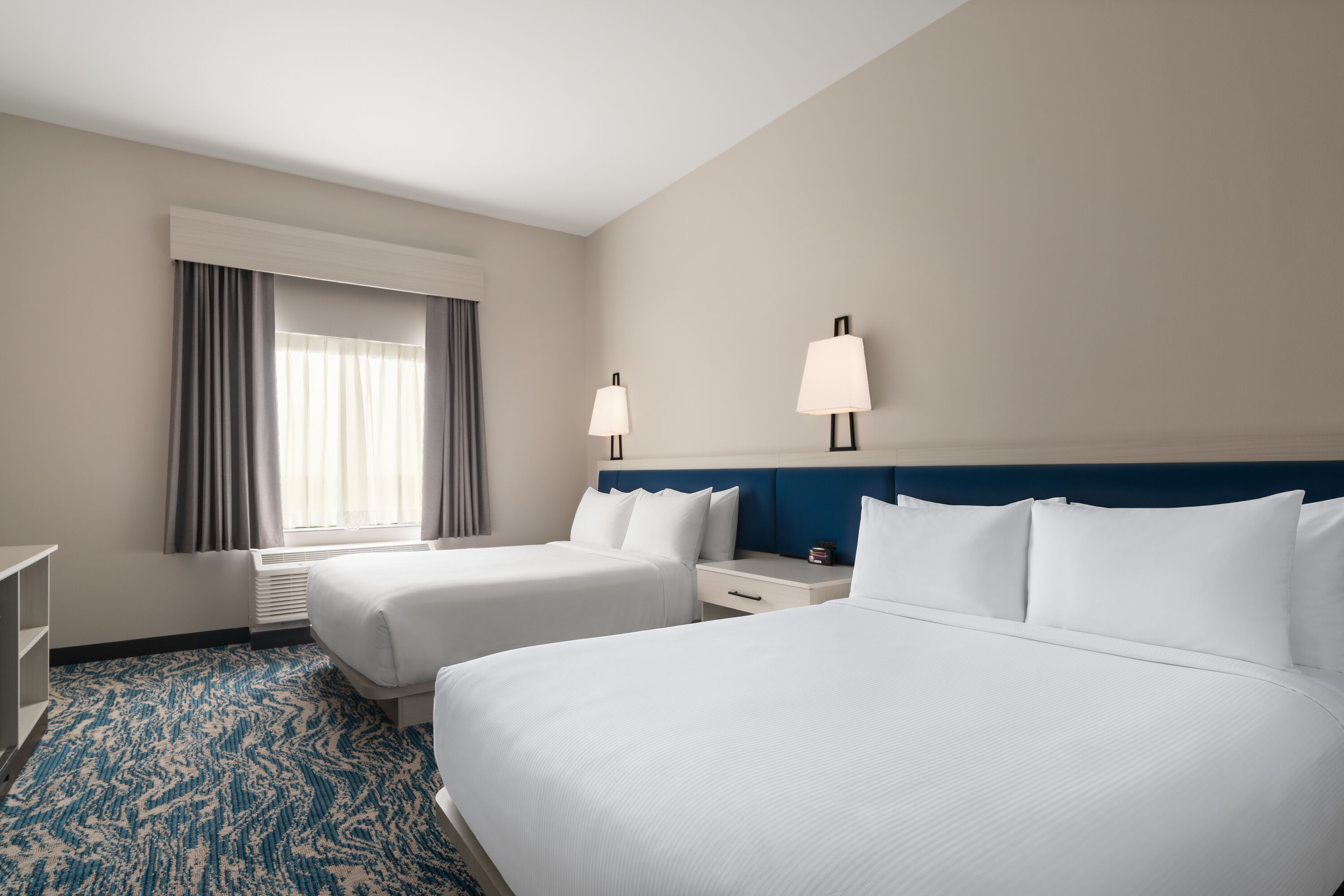 Guest room at the Sugar Creek Hotel, Trademark Collection by Wyndham in Hinton, Oklahoma