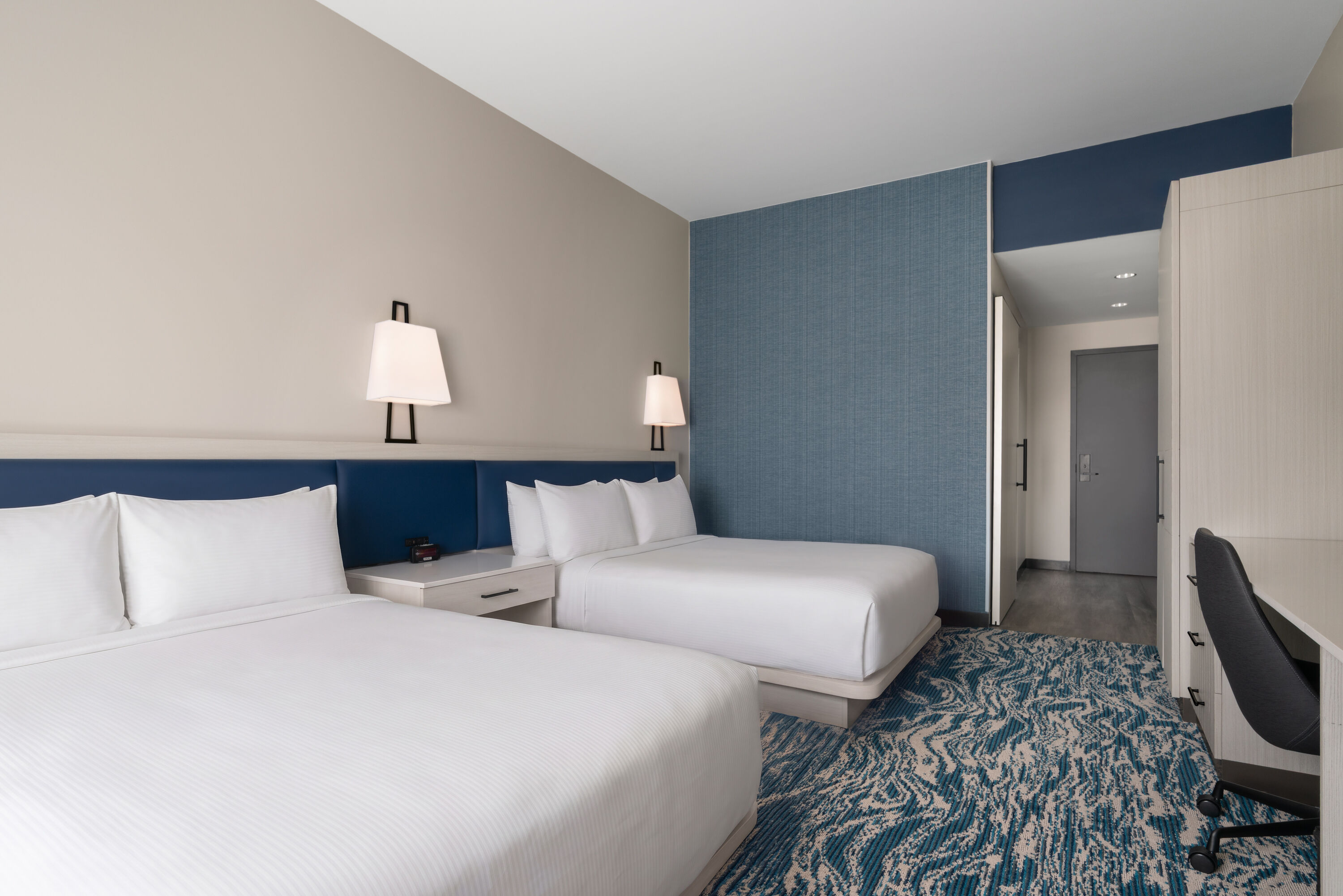 Guest room at the Sugar Creek Hotel, Trademark Collection by Wyndham in Hinton, Oklahoma