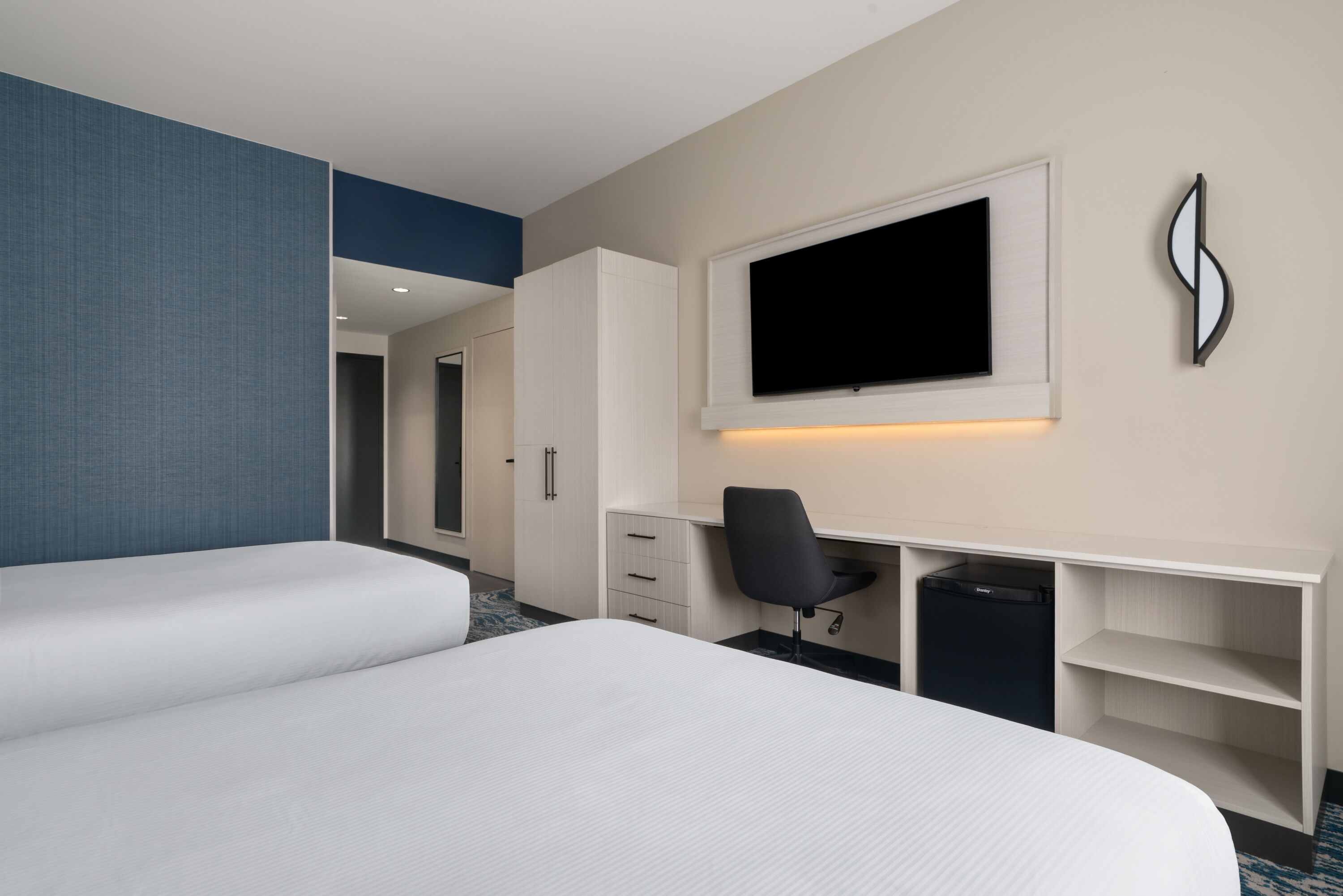 Guest room at the Sugar Creek Hotel, Trademark Collection by Wyndham in Hinton, Oklahoma