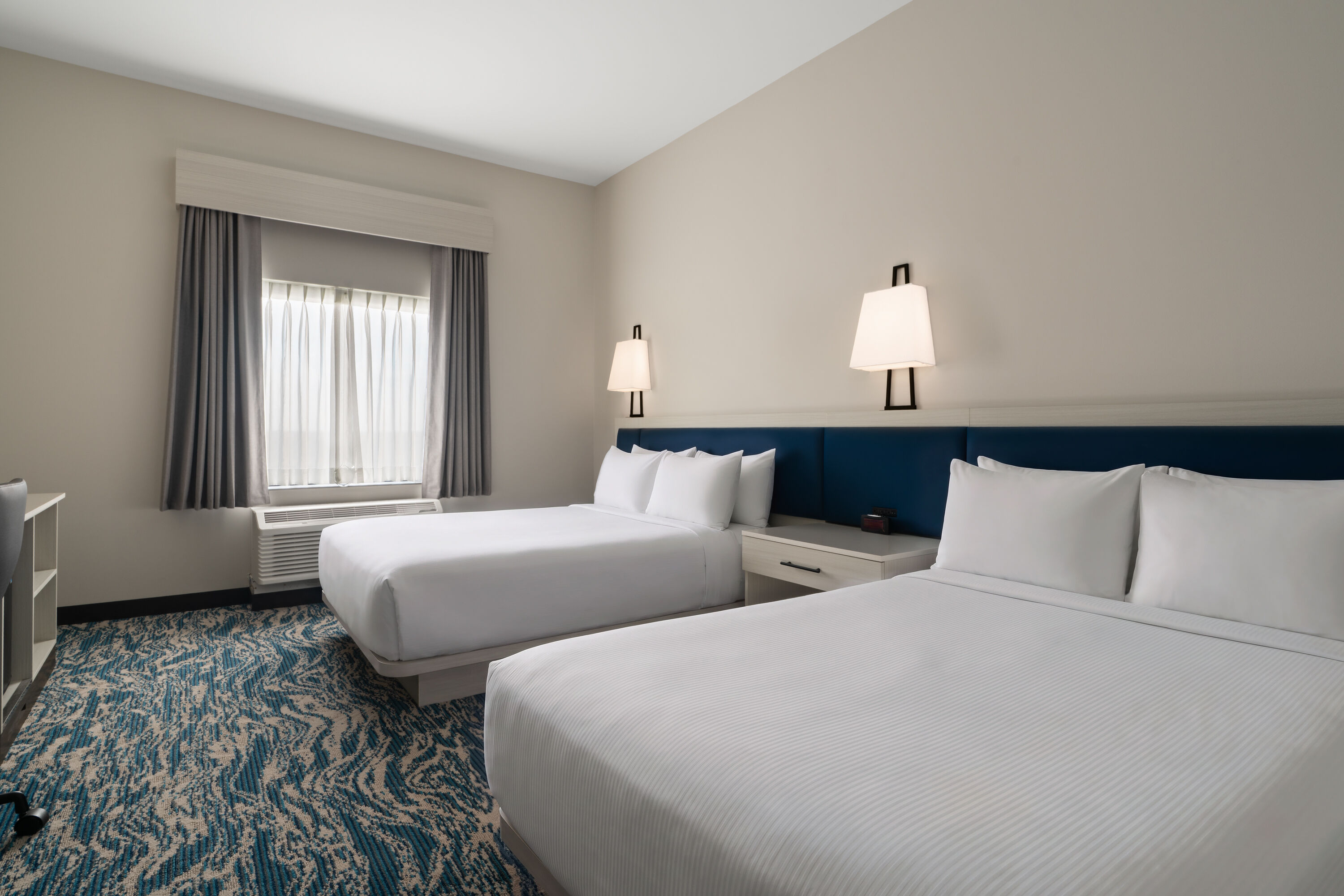 Guest room at the Sugar Creek Hotel, Trademark Collection by Wyndham in Hinton, Oklahoma