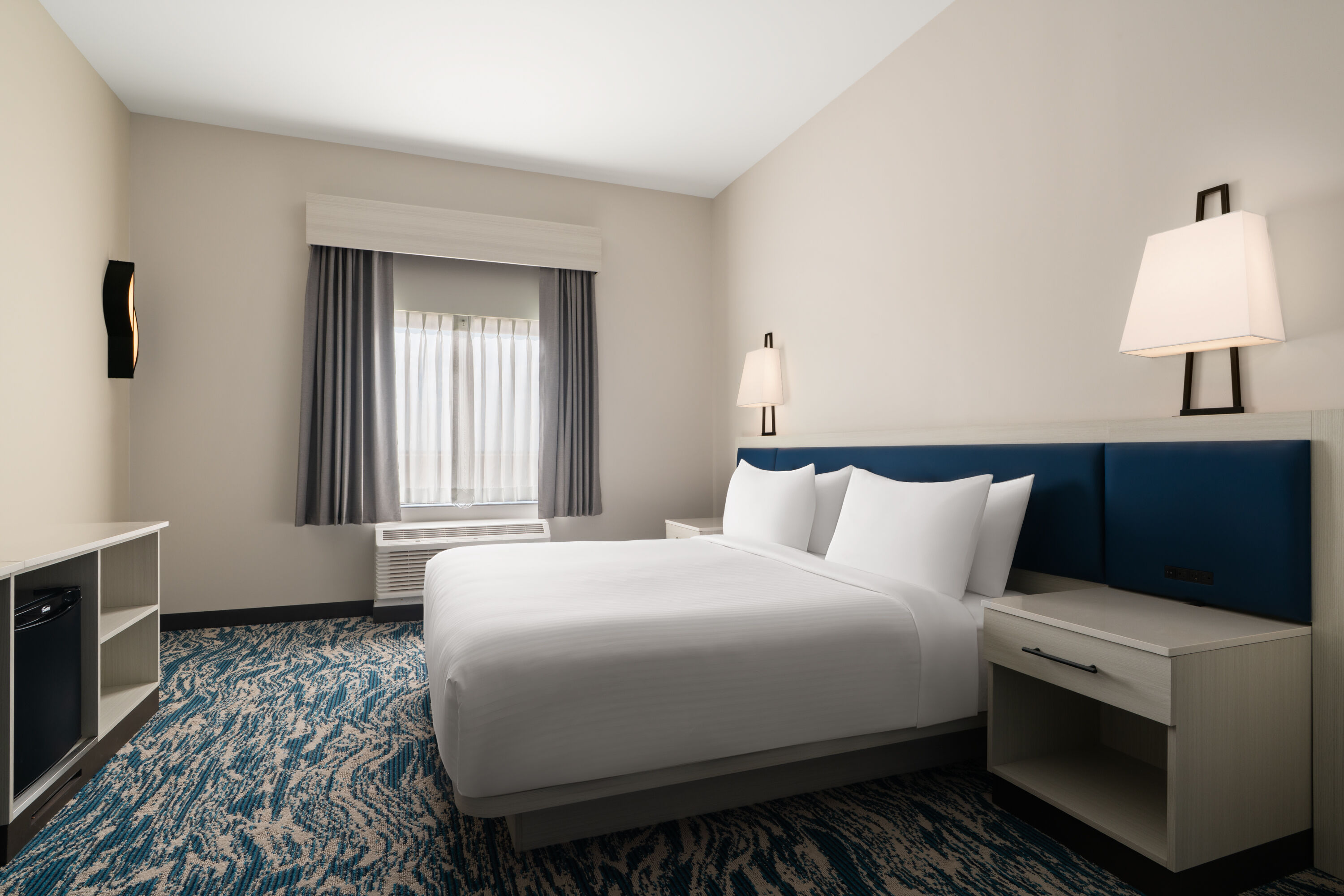 Guest room at the Sugar Creek Hotel, Trademark Collection by Wyndham in Hinton, Oklahoma