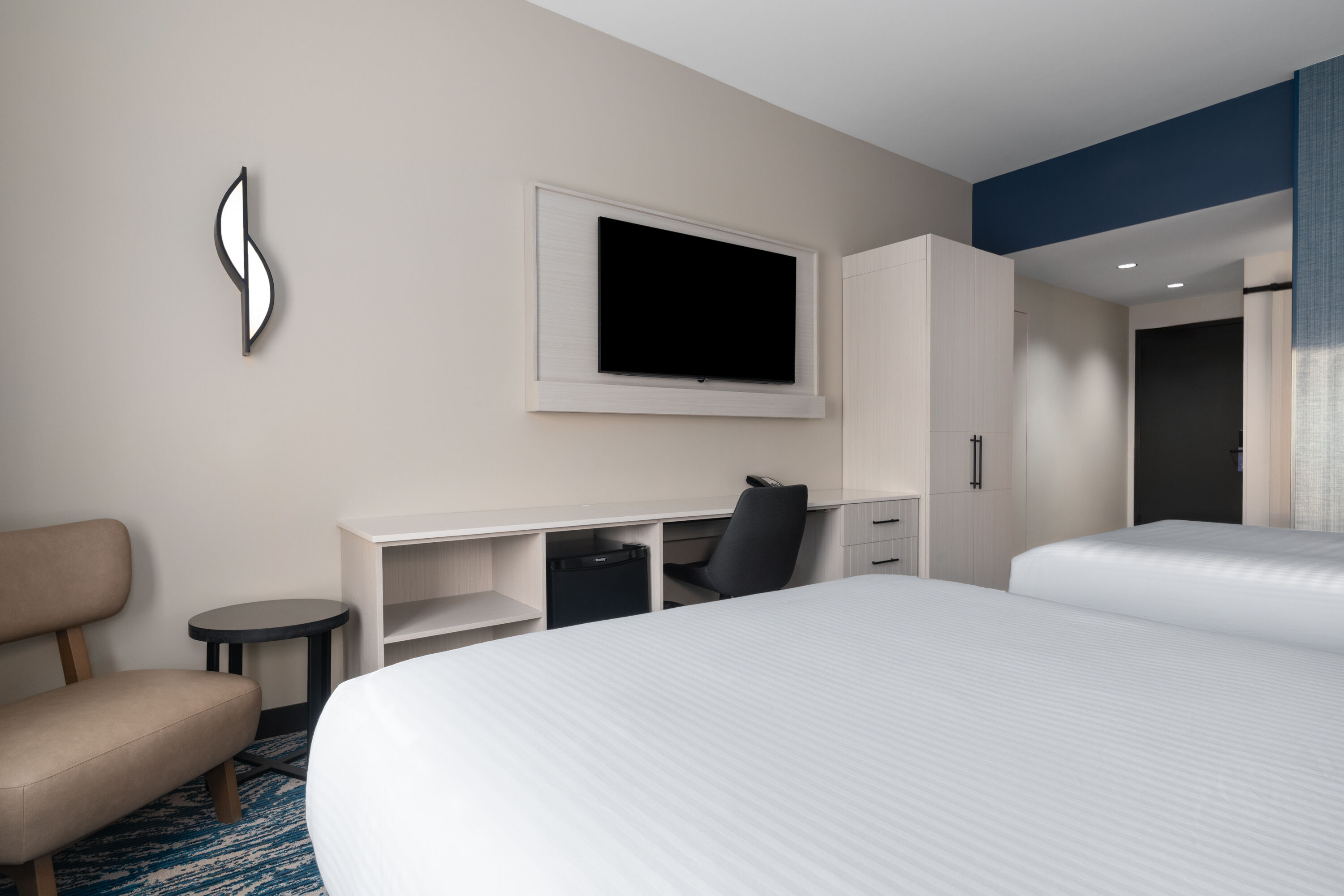 Guest room at the Sugar Creek Hotel, Trademark Collection by Wyndham in Hinton, Oklahoma
