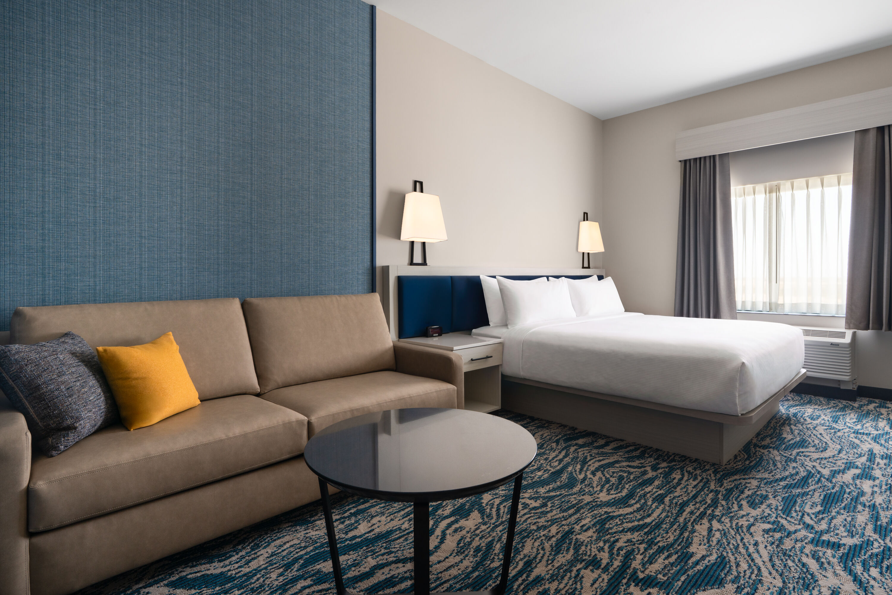 Guest room at the Sugar Creek Hotel, Trademark Collection by Wyndham in Hinton, Oklahoma