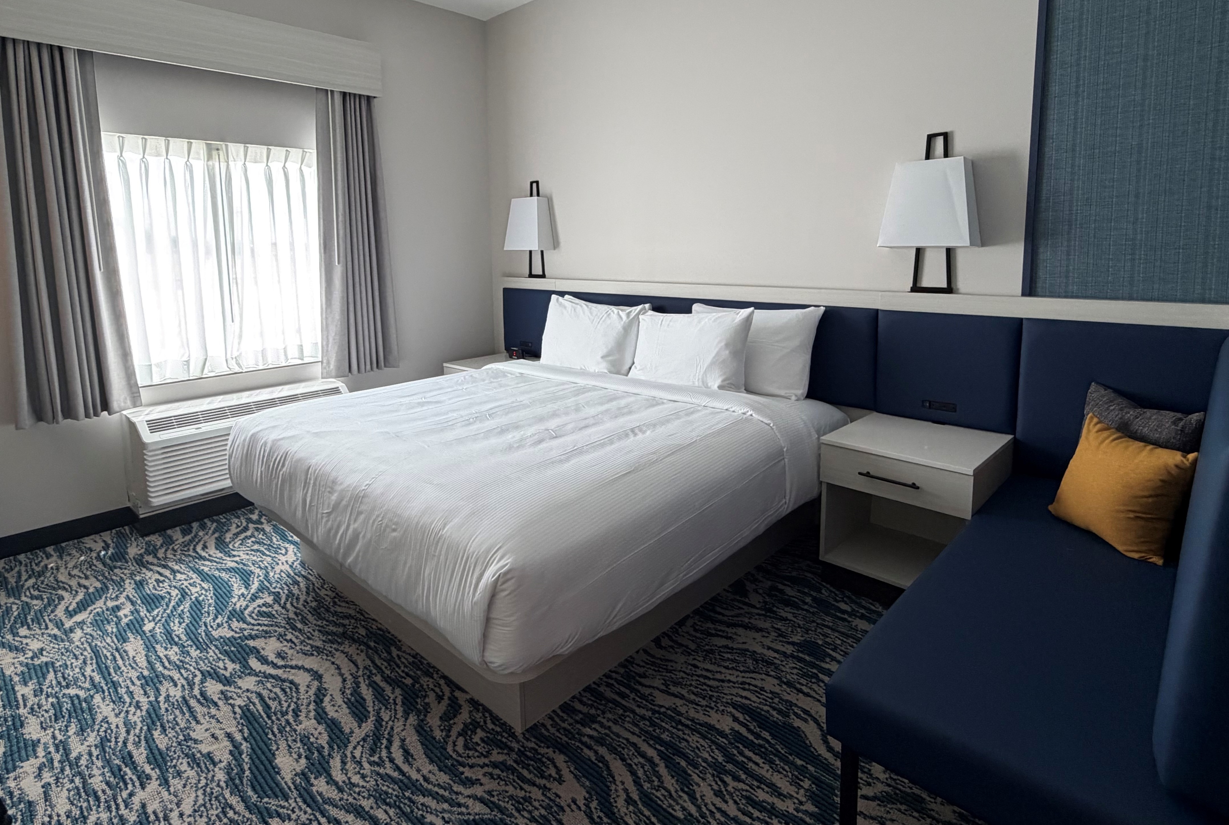 Guest room at the Sugar Creek Hotel, Trademark Collection by Wyndham in Hinton, Oklahoma