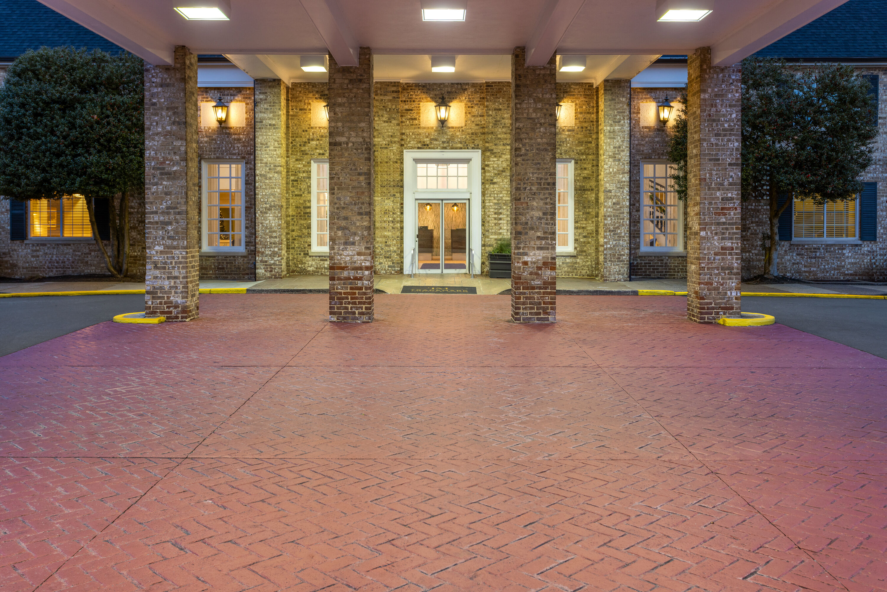 Exterior Dusk Image of Penn Harris Hotel Harrisburg, Trademark by Wyndham hotel in Camp Hill, Pennsylvania
