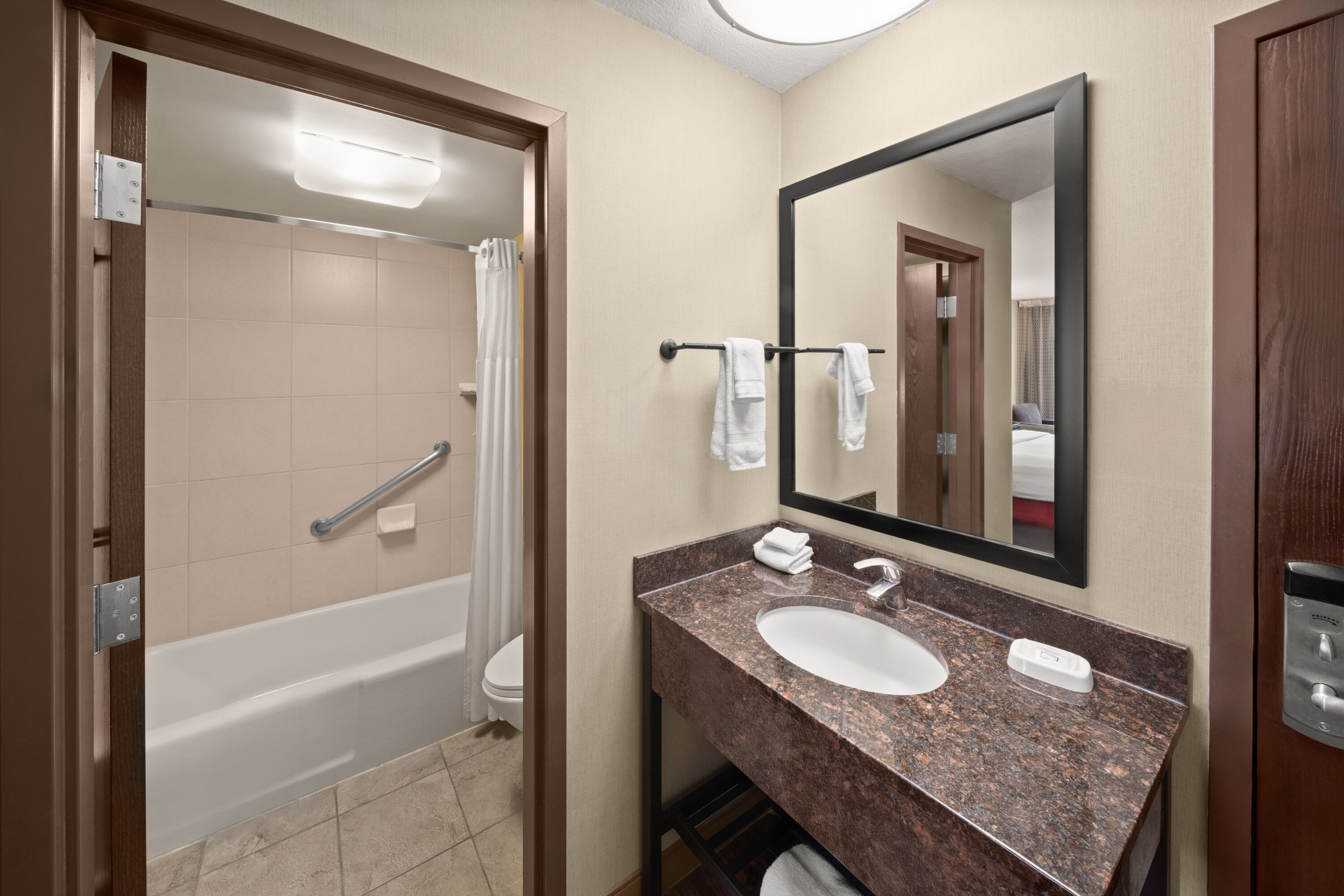 Guest room bath at the Heritage Inn & Suites San Antonio Airport, Trademark Wyndham in San Antonio, Texas