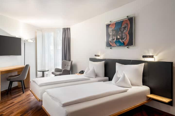 Guest room at the Vienna House by Wyndham Martinspark Dornbirn in Dornbirn, Other than US/Canada