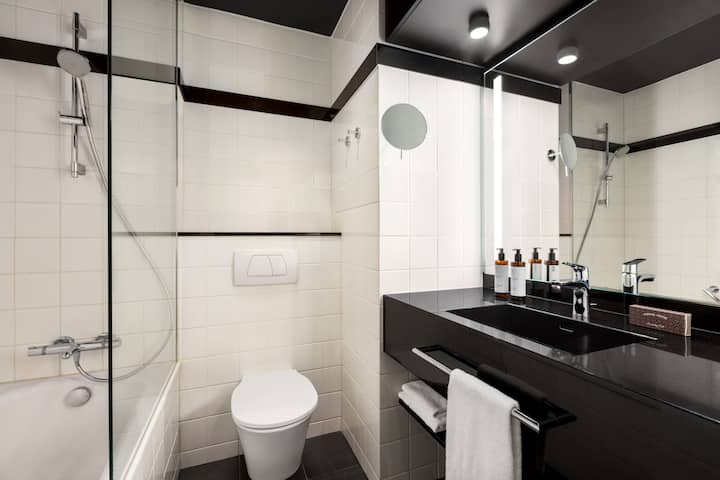 Guest room bath at the Vienna House by Wyndham Diplomat Prague in Prague, Other than US/Canada