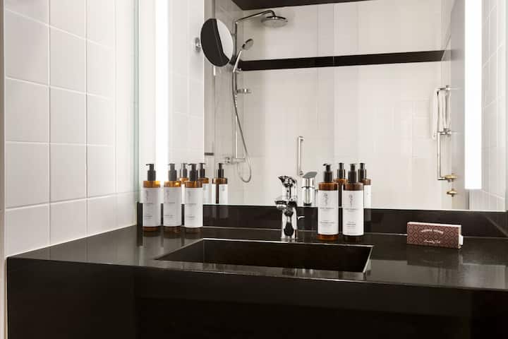 Guest room bath at the Vienna House by Wyndham Diplomat Prague in Prague, Other than US/Canada