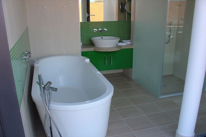 Guest room bath at the Vienna House by Wyndham Andel's Prague in Prague, Other than US/Canada