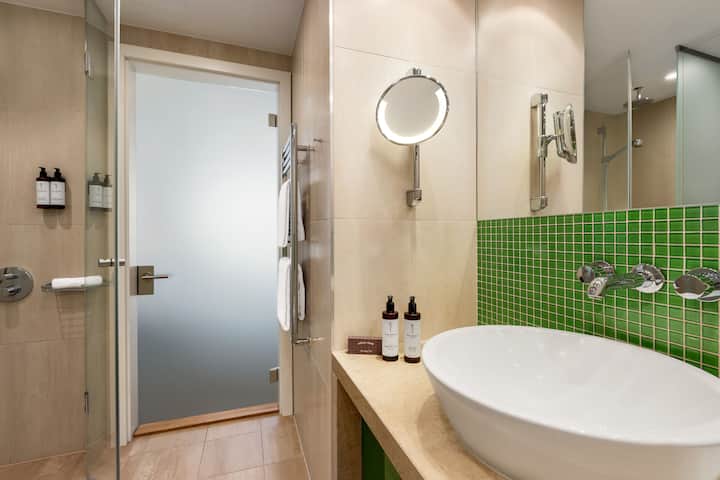 Guest room bath at the Vienna House by Wyndham Andel's Prague in Prague, Other than US/Canada