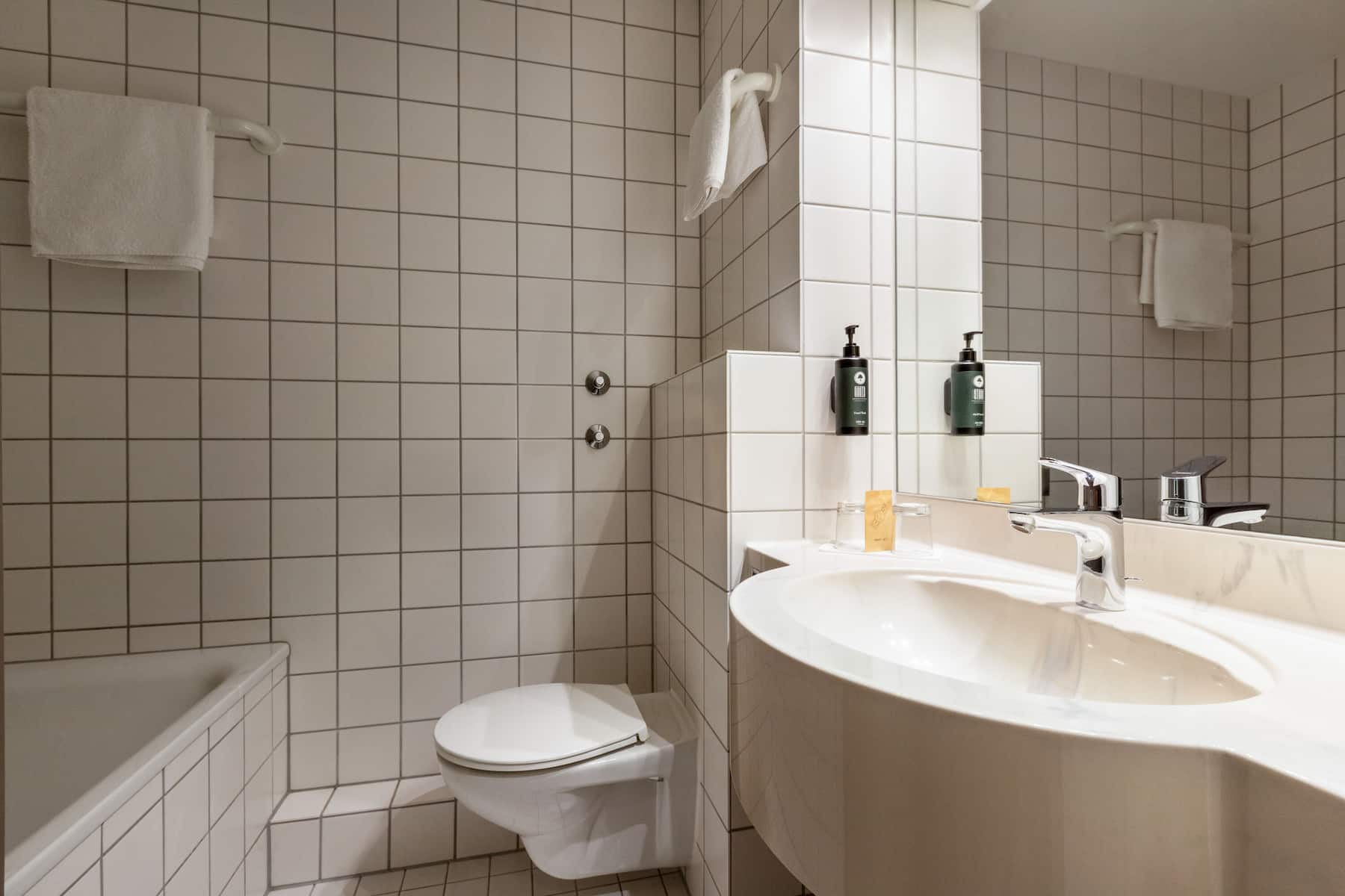 Guest room bath at the Vienna House Easy by Wyndham Amberg in Amberg, Other than US/Canada