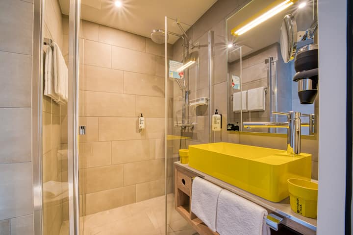 Guest room bath at the Vienna House Easy by Wyndham Augsburg in Augsburg, Other than US/Canada