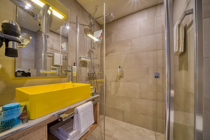 Guest room bath at the Vienna House Easy by Wyndham Augsburg in Augsburg, Other than US/Canada