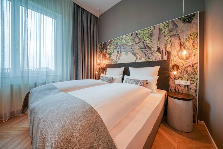 Guest room at the Vienna House Easy by Wyndham Augsburg in Augsburg, Other than US/Canada