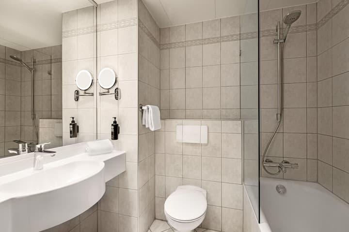 Guest room bath at the Vienna House Easy by Wyndham Coburg in Coburg, Other than US/Canada