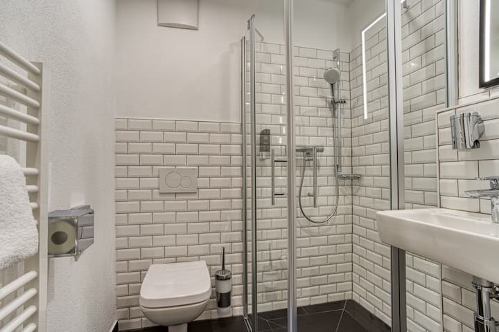 Guest room bath at the Vienna House Easy by Wyndham Ingolstadt in Ingolstadt, Other than US/Canada