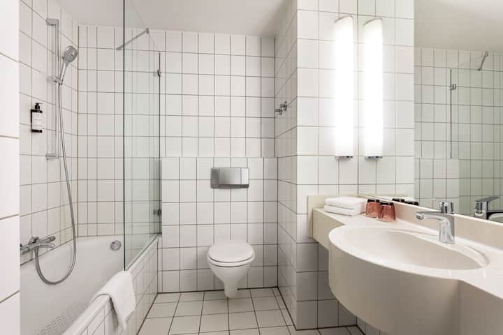 Guest room bath at the Vienna House Easy by Wyndham Limburg in Limburg, Other than US/Canada