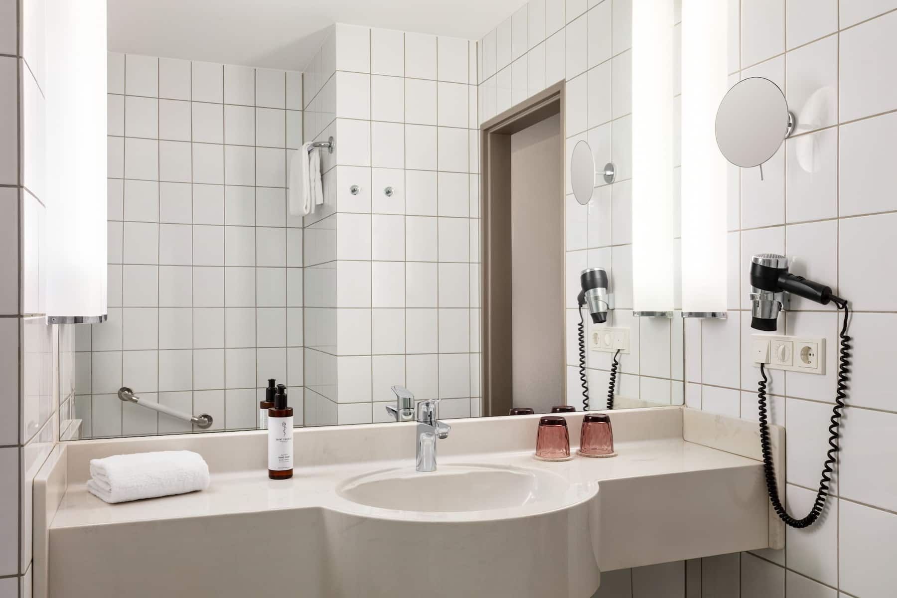 Guest room bath at the Vienna House Easy by Wyndham Limburg in Limburg, Other than US/Canada