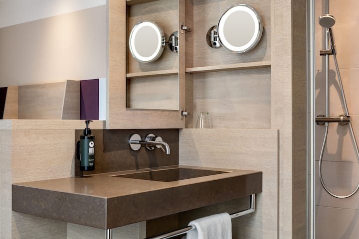 Guest room bath at the Vienna House Easy by Wyndham Osnabruck in Osnabrueck, Other than US/Canada
