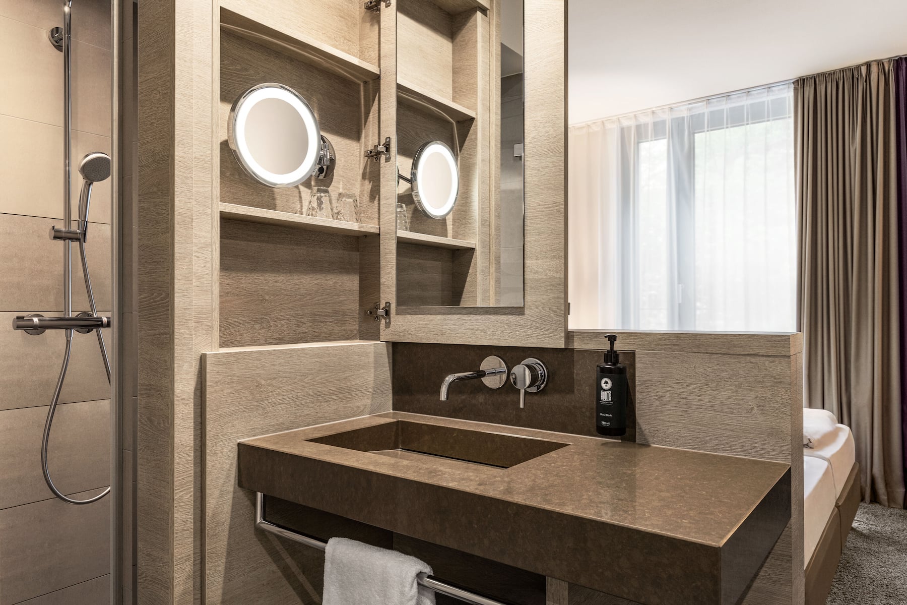 Guest room bath at the Vienna House Easy by Wyndham Osnabruck in Osnabrueck, Other than US/Canada