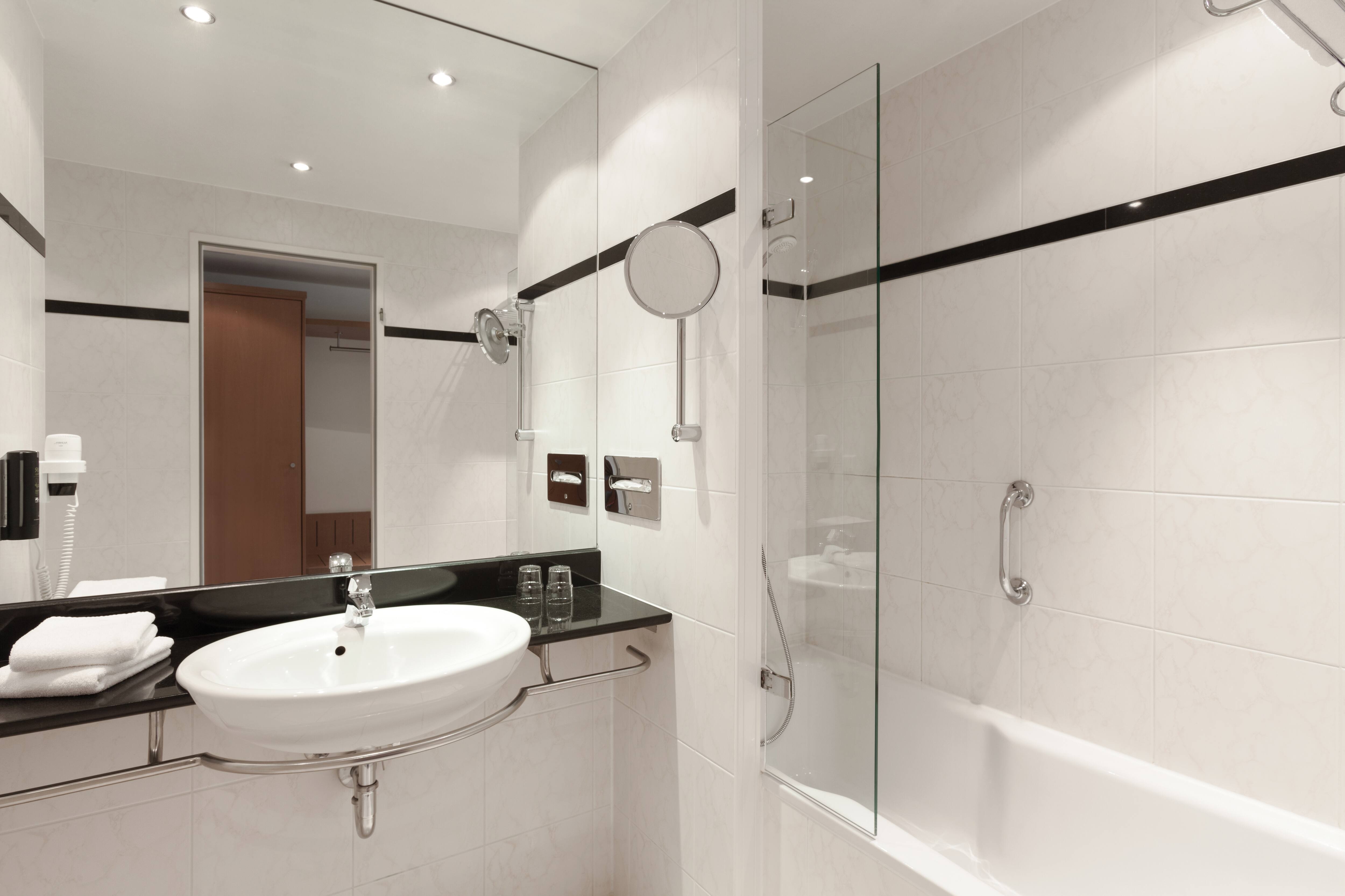 Guest room bath at the Vienna House by Wyndham Baltic Stralsund in Stralsund, Other than US/Canada
