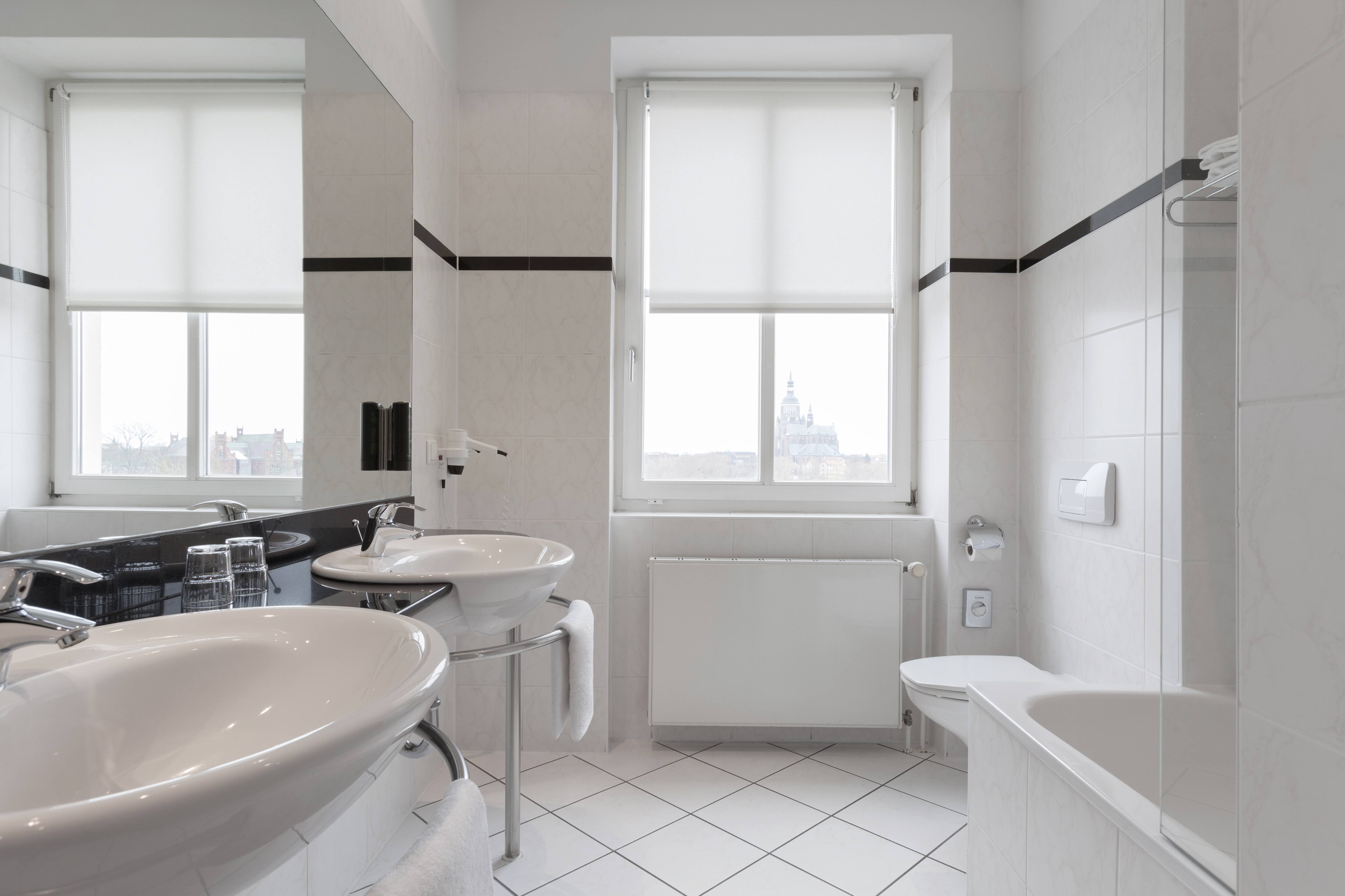 Guest room bath at the Vienna House by Wyndham Baltic Stralsund in Stralsund, Other than US/Canada