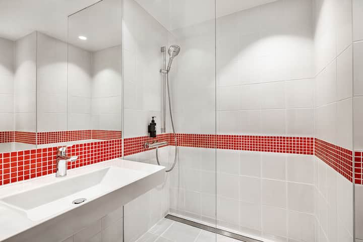 Guest room bath at the Vienna House Easy by Wyndham Cracow in Cracow, Other than US/Canada