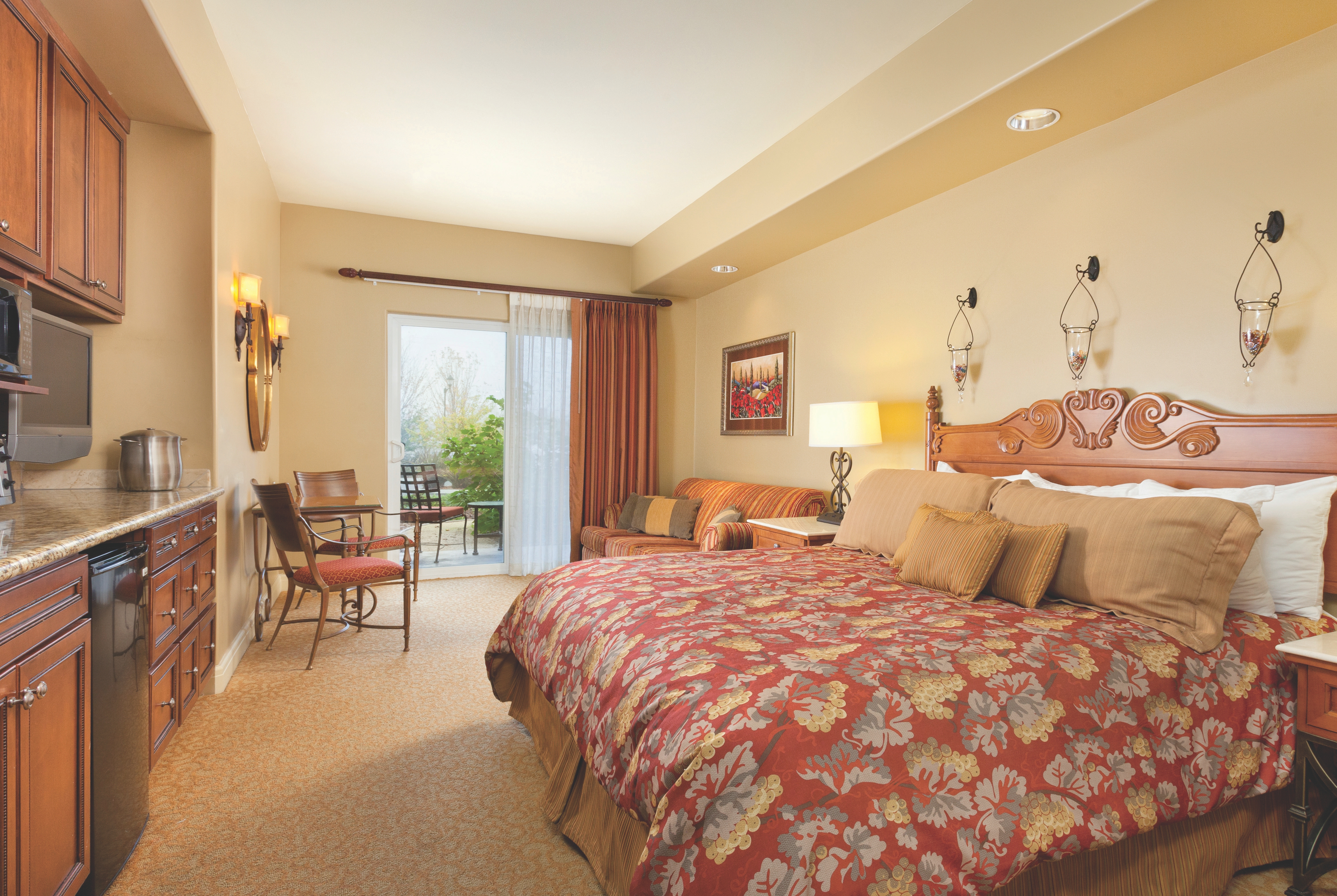 King bed guest room at the Vino Bello Resort in Napa, California