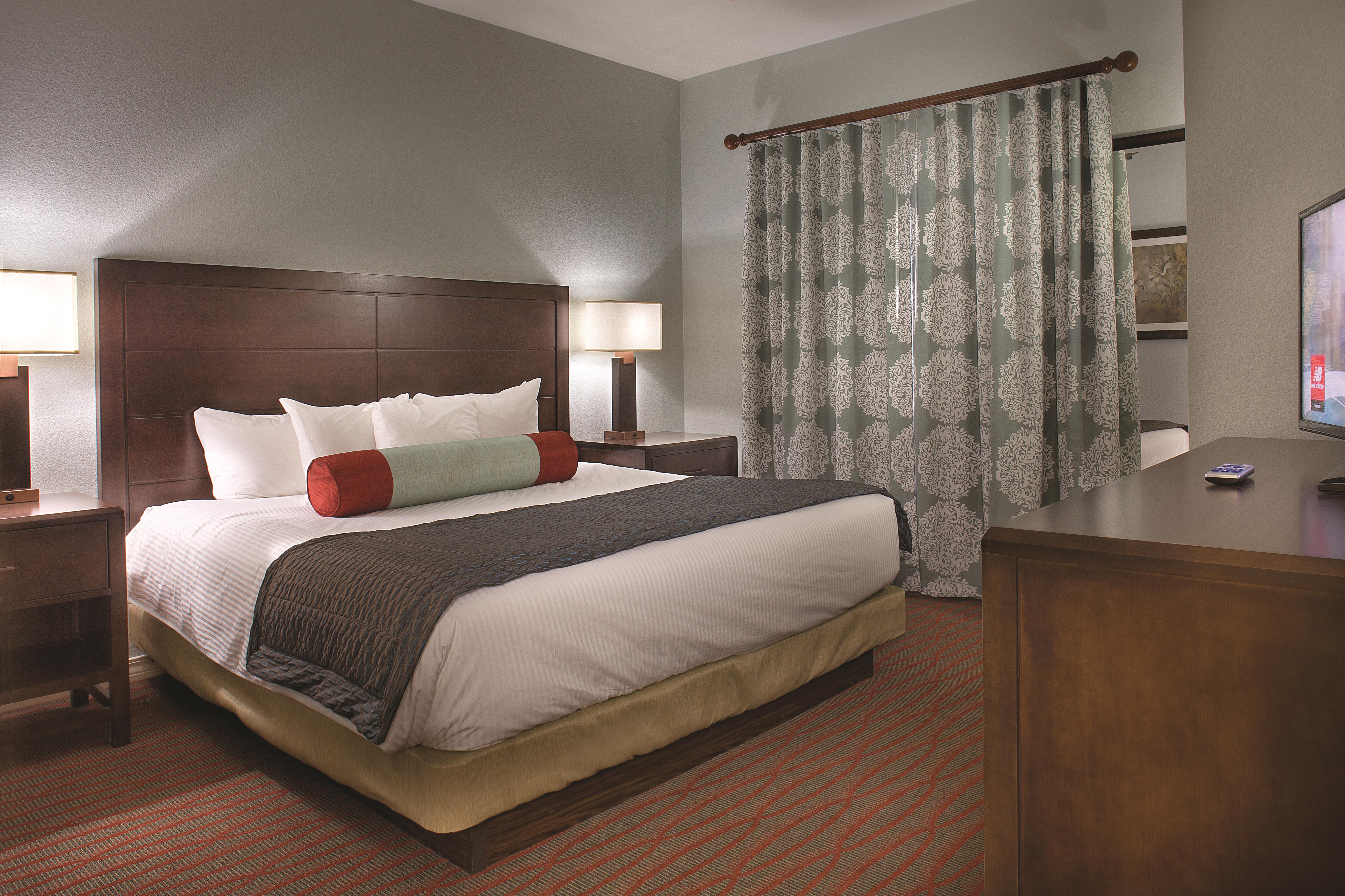 King bed guest room at the Club Wyndham Branson at the Meadows in Branson, Missouri