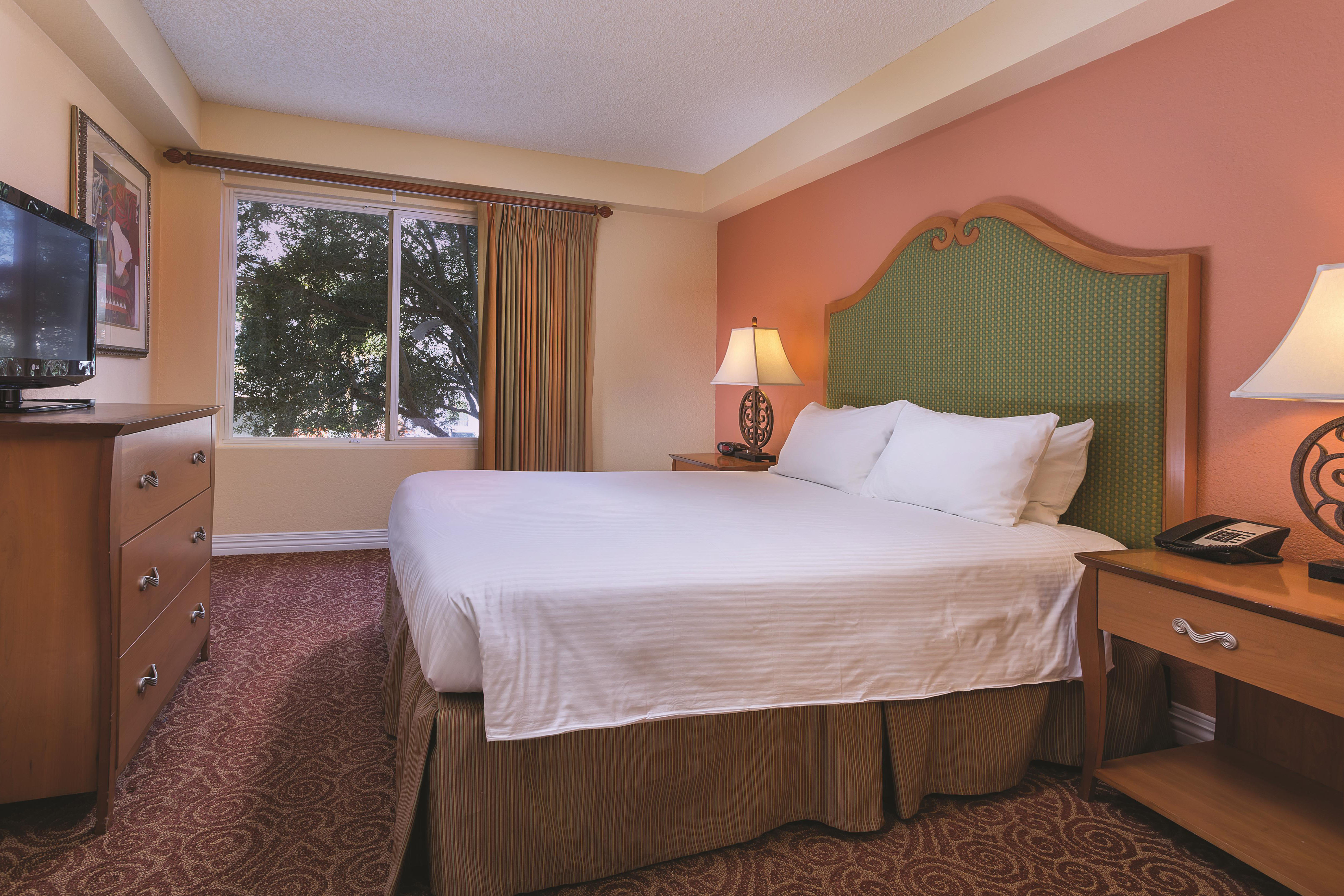 King bed guest room at the Club Wyndham Desert Rose Resort in Las Vegas, Nevada