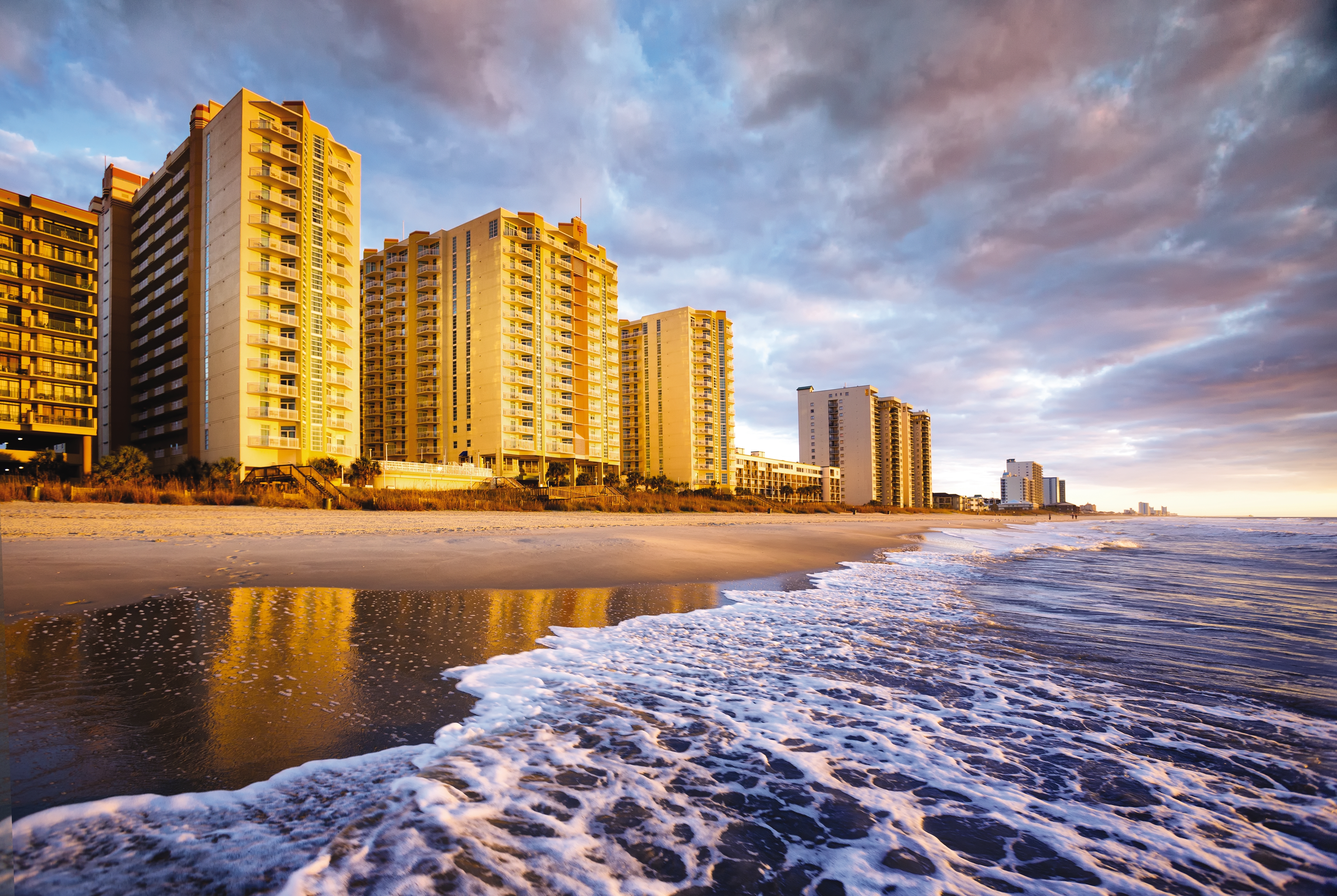 Exterior Dusk Image of Club Wyndham Ocean Boulevard hotel in North Myrtle Beach, South Carolina