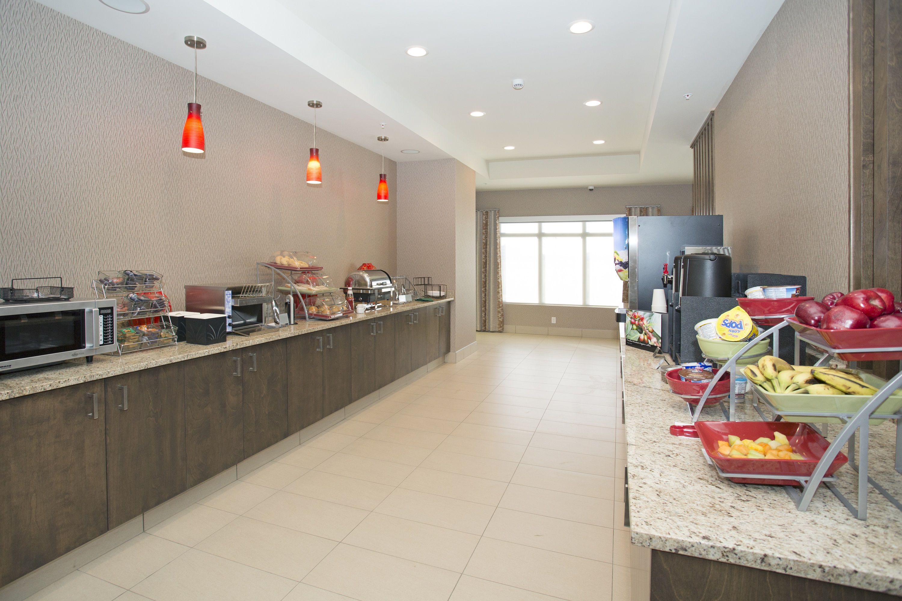 Wingate by Wyndham Calgary Airport restaurant breakfast area with seating in Calgary, Alberta