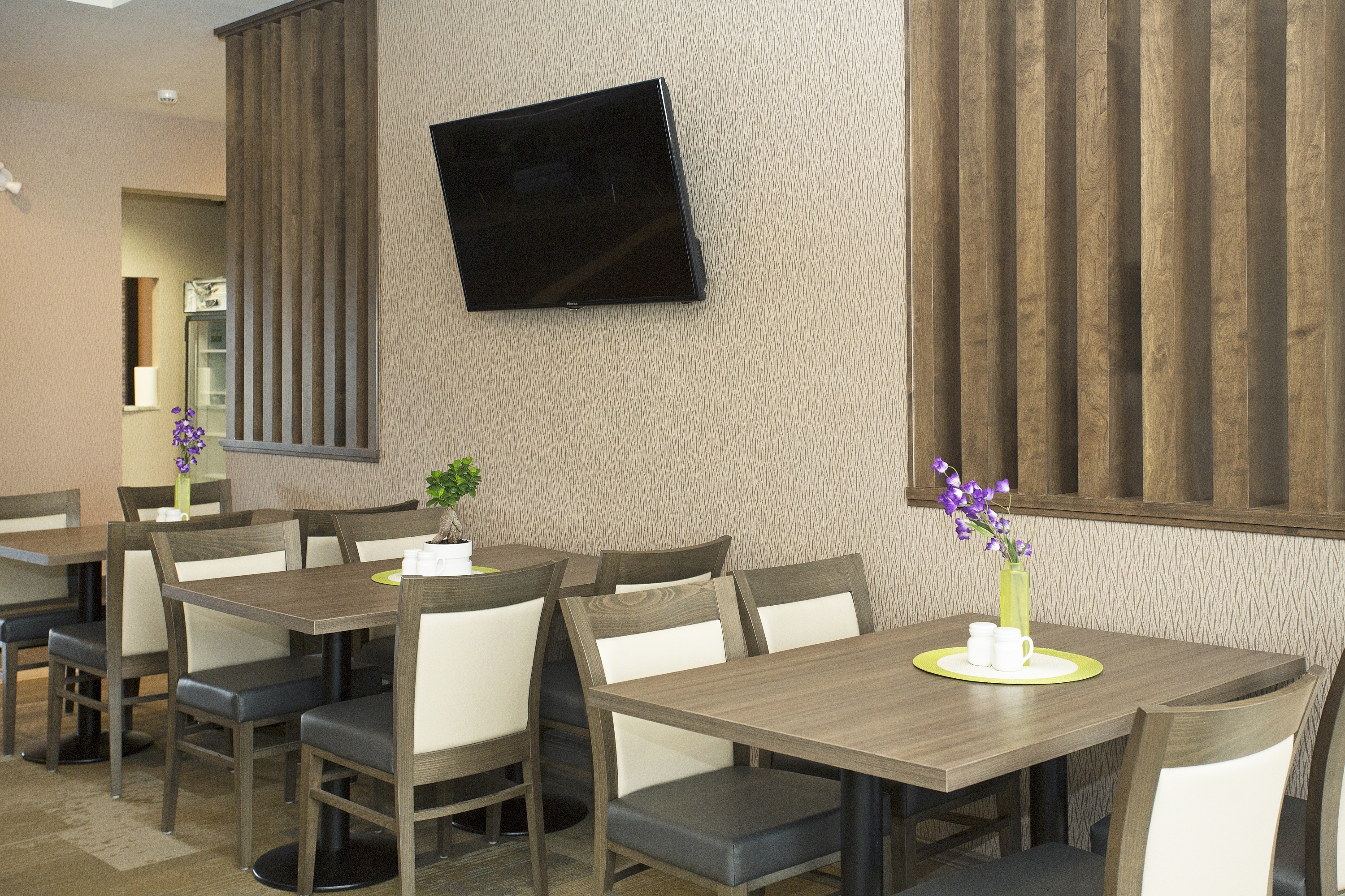 Wingate by Wyndham Calgary Airport restaurant breakfast area with seating in Calgary, Alberta