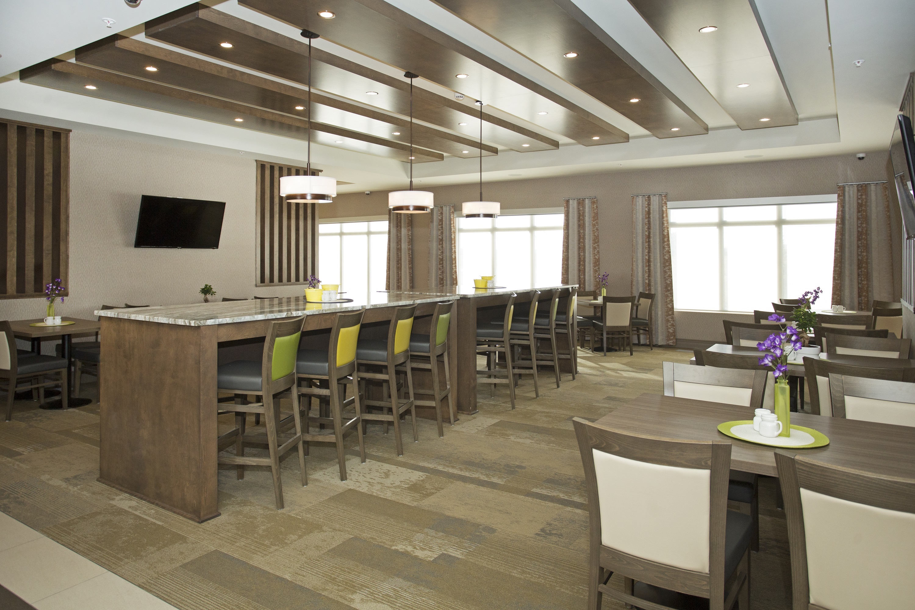 Wingate by Wyndham Calgary Airport restaurant breakfast area with seating in Calgary, Alberta