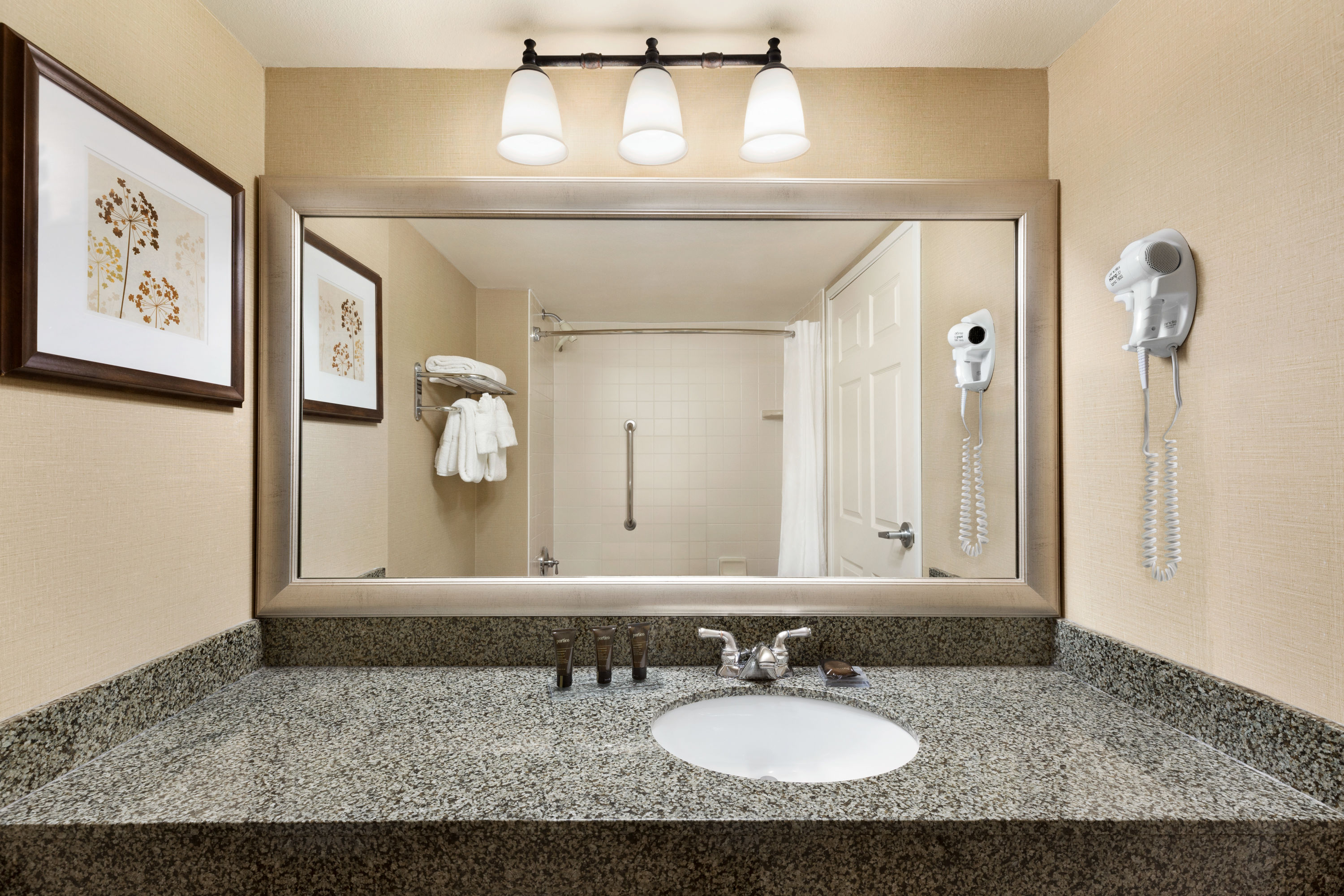 Guest room bath at the Wingate by Wyndham Greenwood Village/Denver Tech in Greenwood Village, Colorado