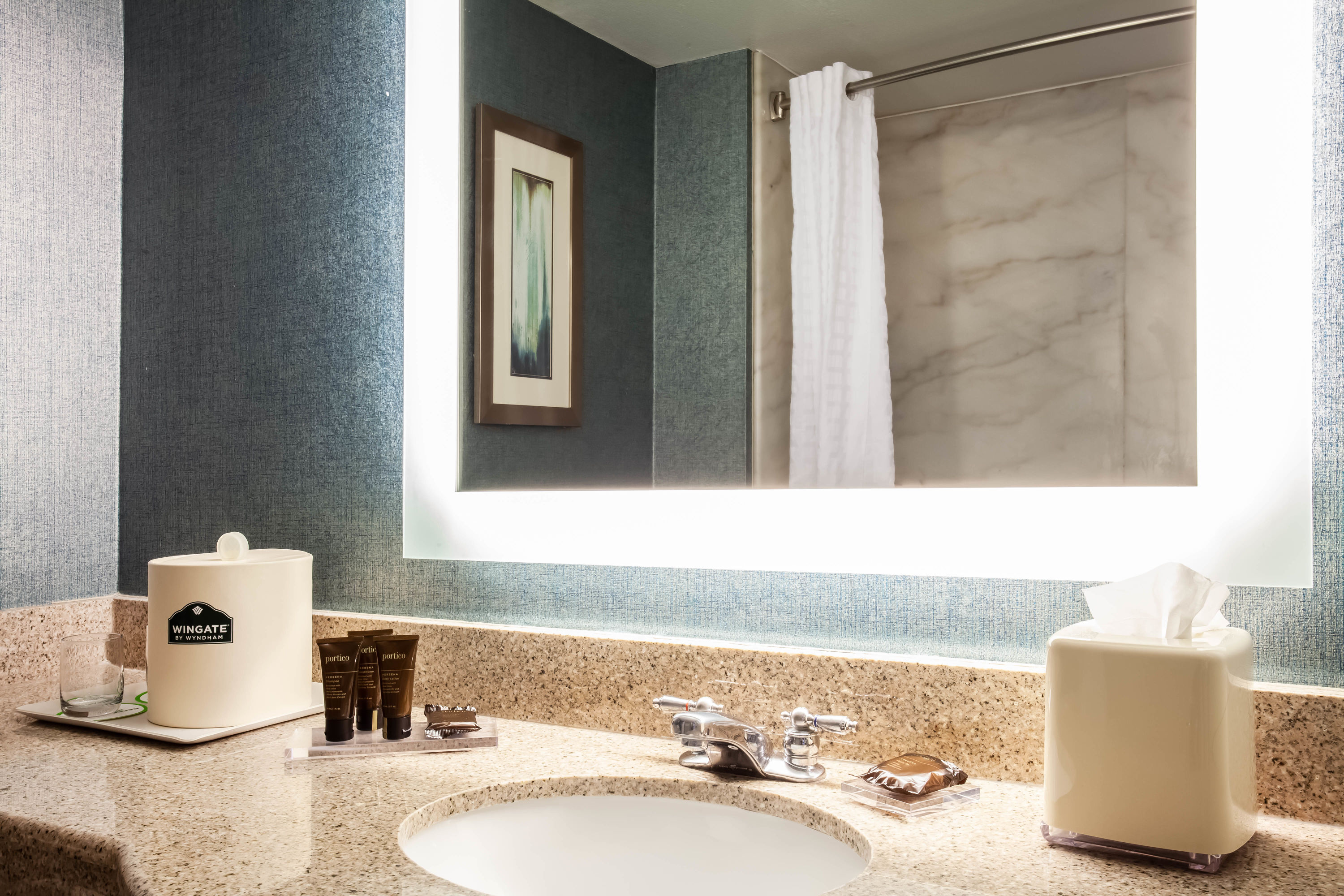 Guest room bath at the Wingate by Wyndham Orlando International Airport in Orlando, Florida