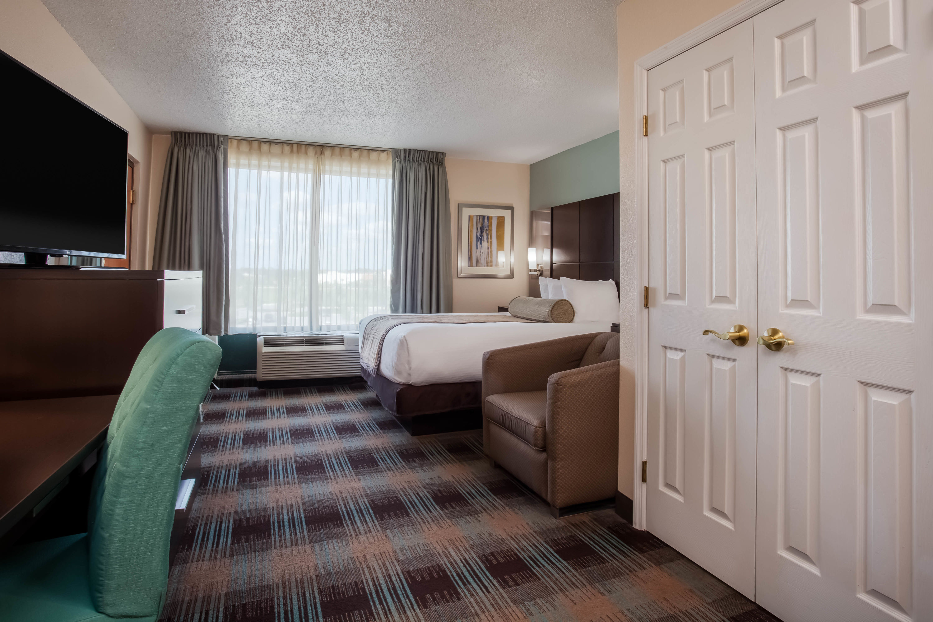Guest room at the Wingate by Wyndham Orlando International Airport in Orlando, Florida