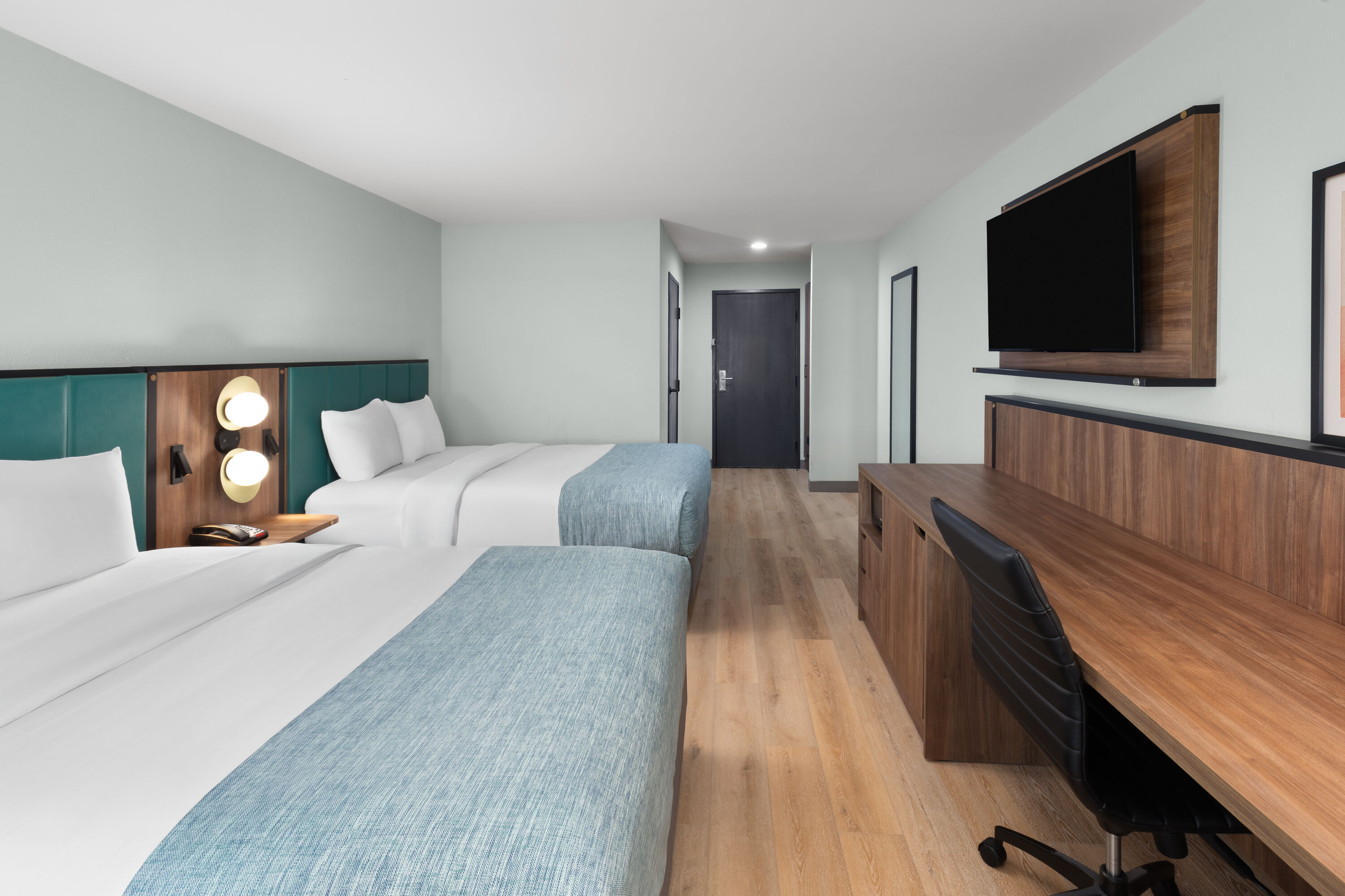 Guest room at the Wingate by Wyndham Augusta I-20 in Augusta, Georgia