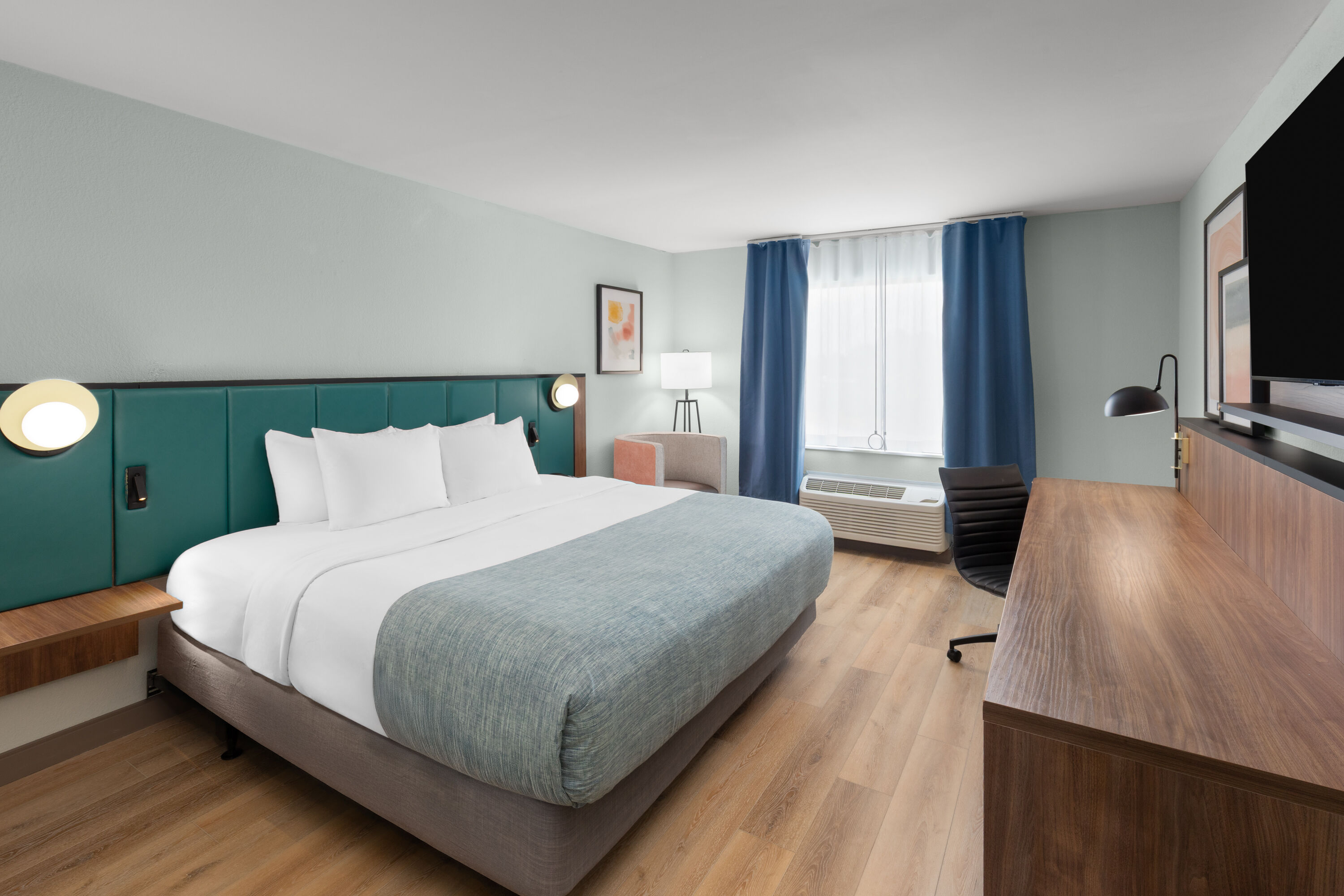 Guest room at the Wingate by Wyndham Augusta I-20 in Augusta, Georgia