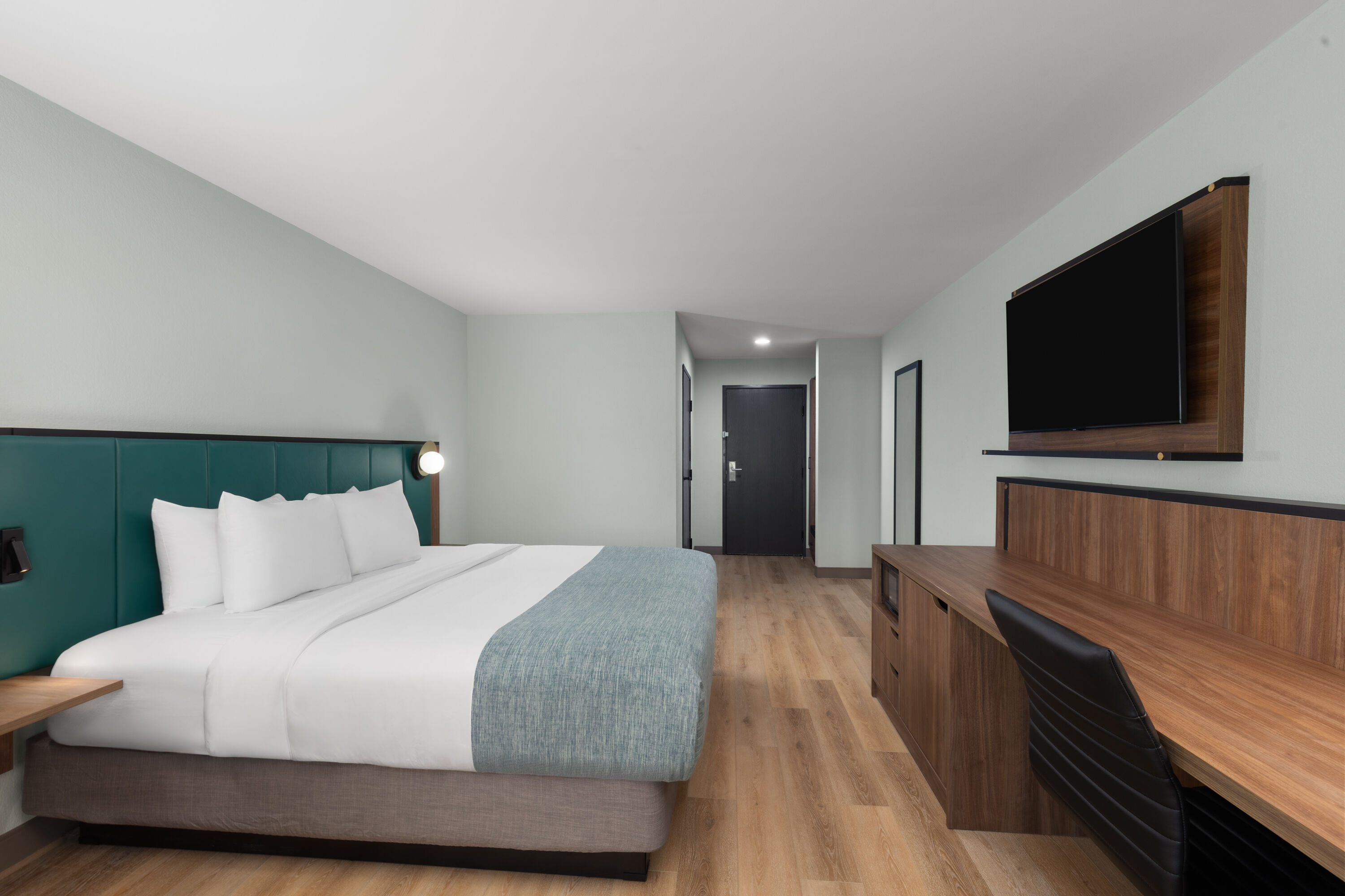 Guest room at the Wingate by Wyndham Augusta I-20 in Augusta, Georgia