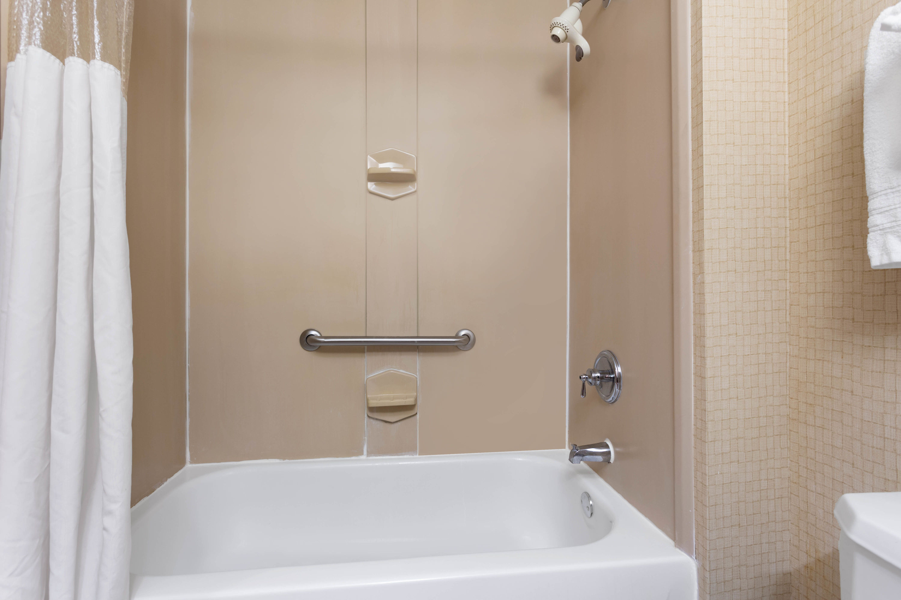 Guest room bath at the Wingate by Wyndham Macon I-75 in Macon, Georgia