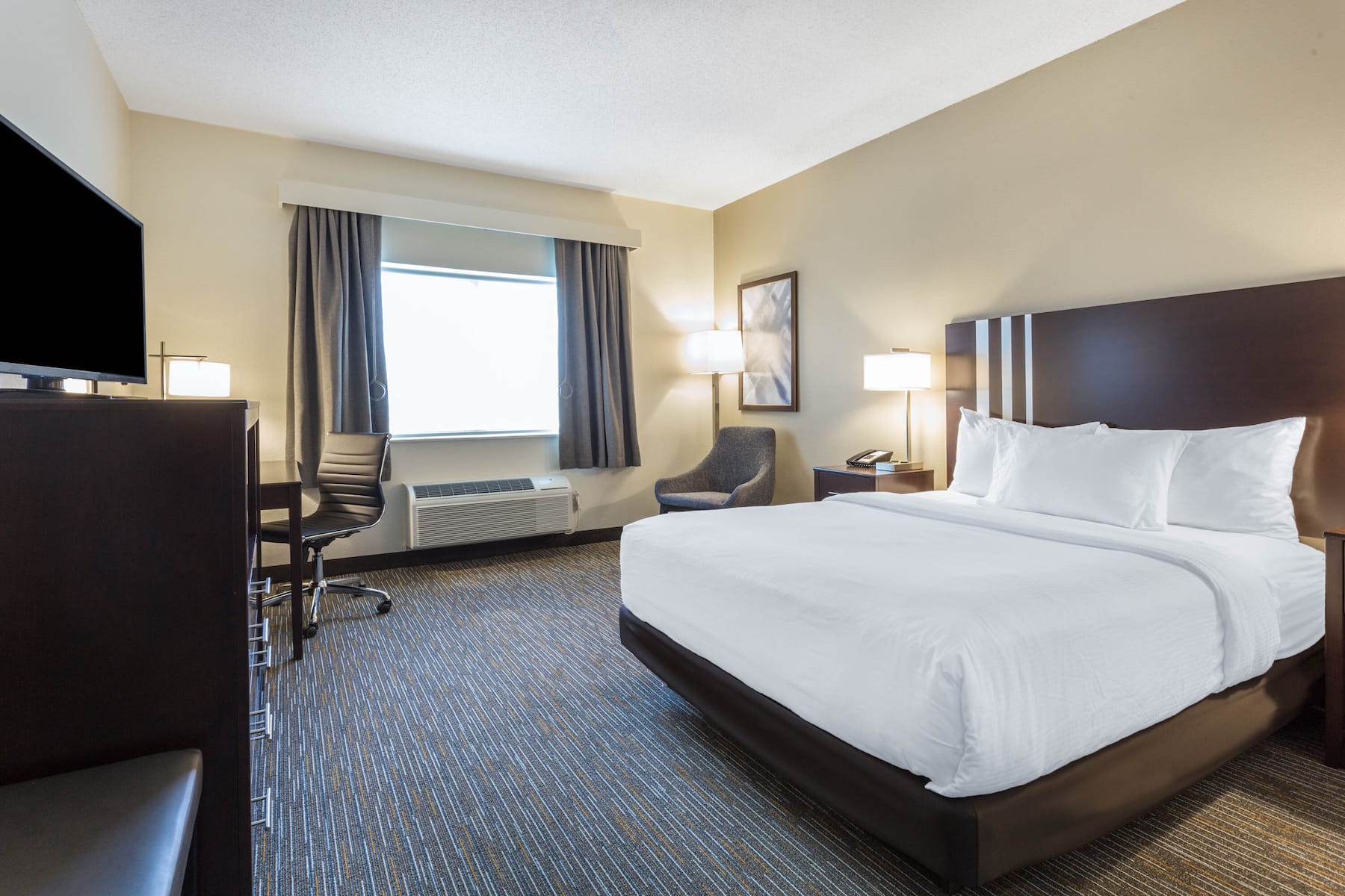 Guest room at the Wingate by Wyndham Gurnee in Gurnee, Illinois