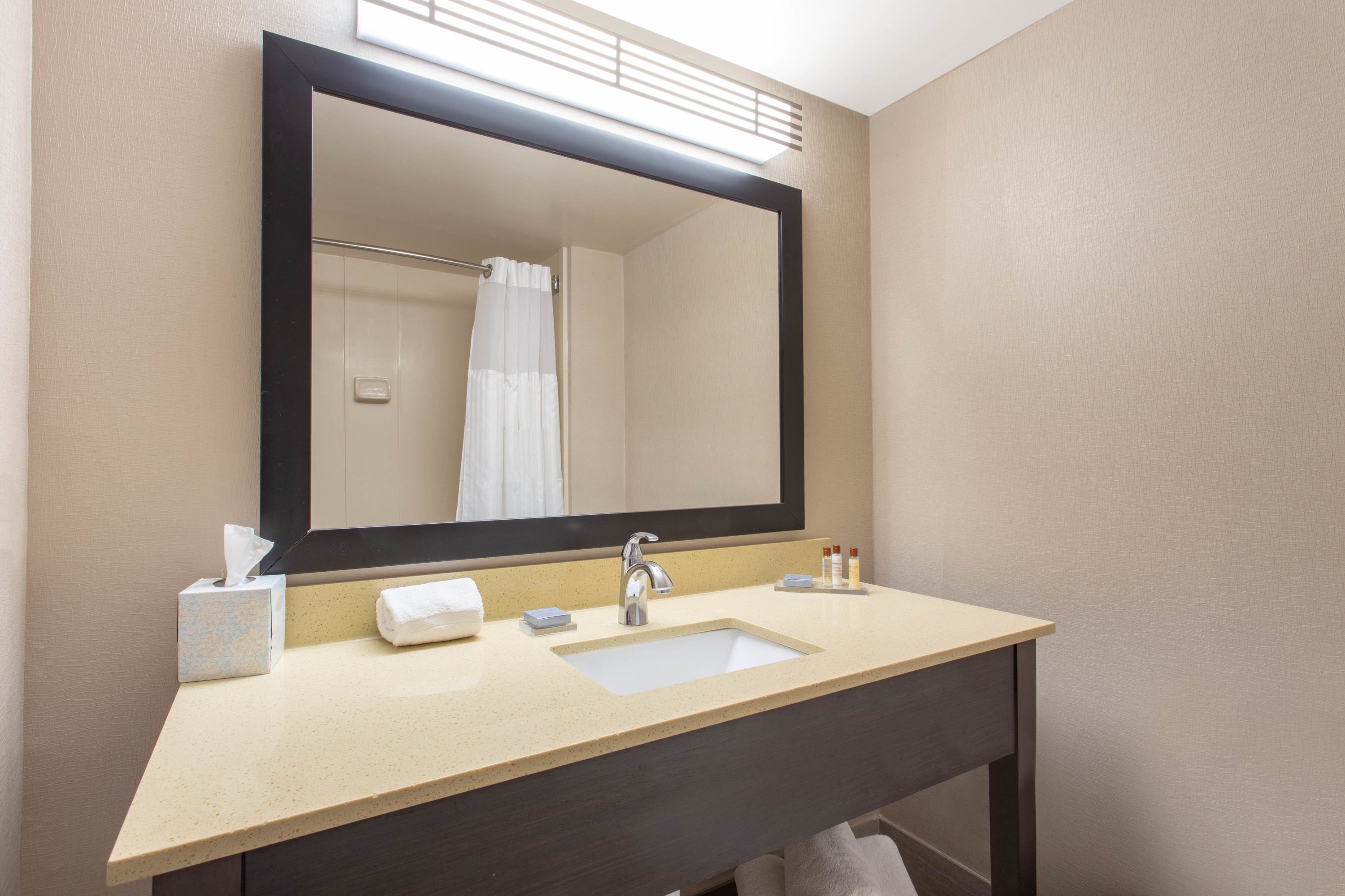 Guest room bath at the Wingate by Wyndham Indianapolis Airport Plainfield in Plainfield, Indiana